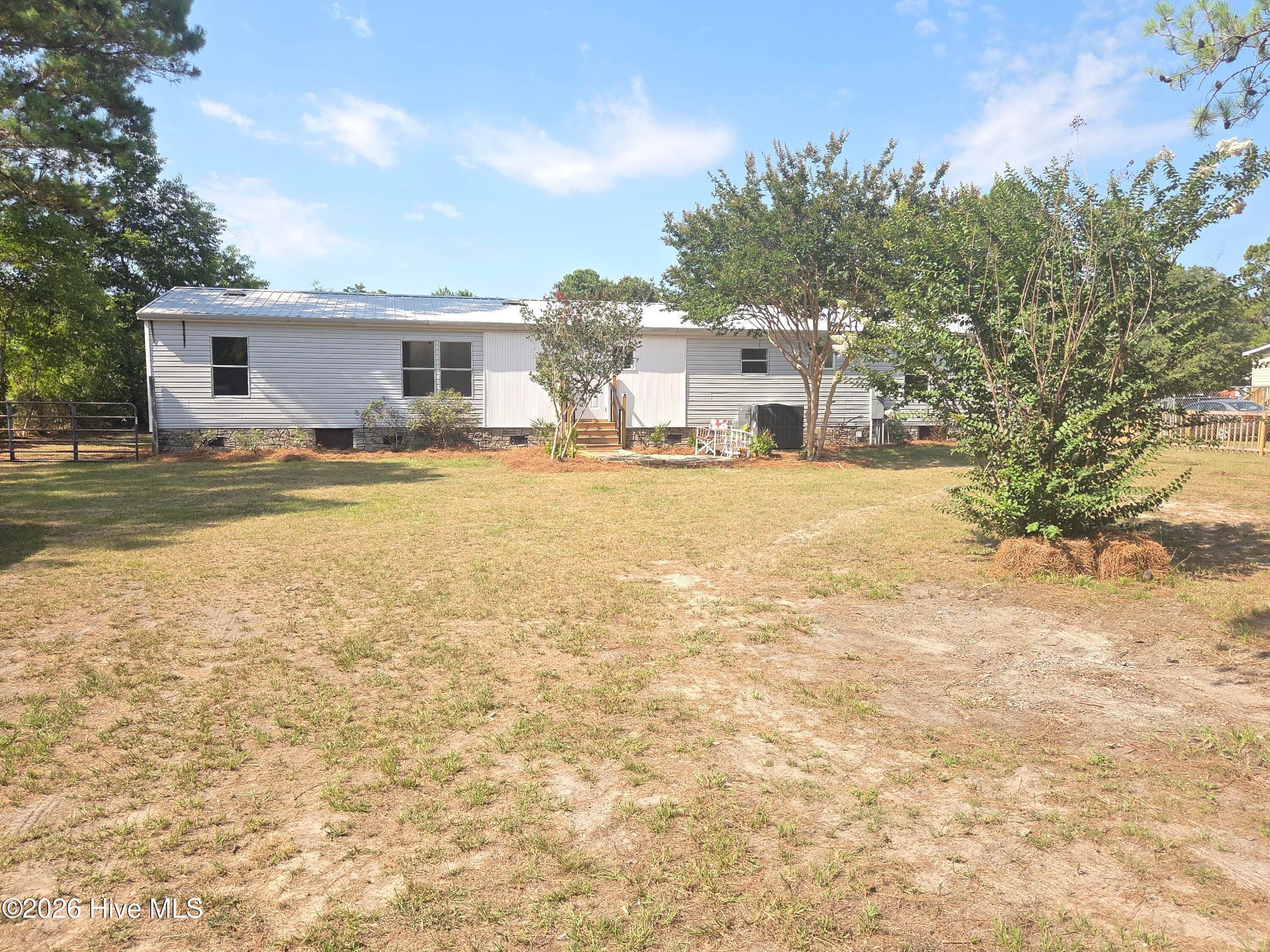 Manufactured Home at 1199 Zack Street SE, Bolivia, NC 28422, photo 3 of 73