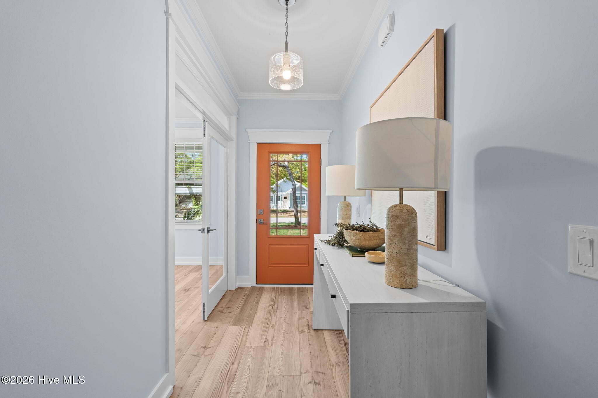 Photos of a staged model of the exact same plan - 312 NE 58th Street, Oak Island, NC 28465