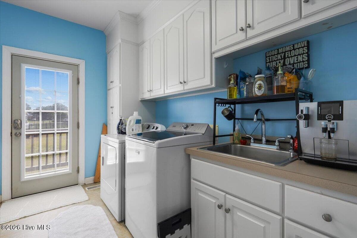 Laundry Room with exterior door - 105 Pointe Drive, La Grange, NC 28551