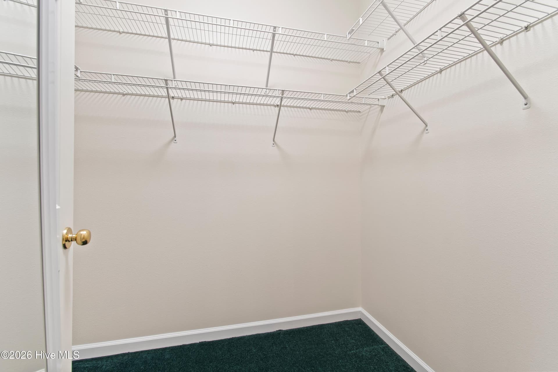 Primary suite walk in closet - 940 Great Egret Circle SW # 2, Sunset Beach, NC 28468