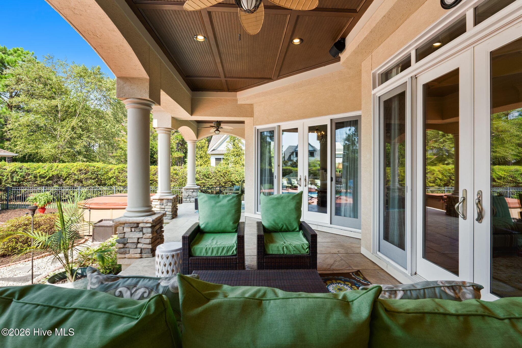 Side view of porch sitting area - 3858 Ridge Crest Drive, Southport, NC 28461