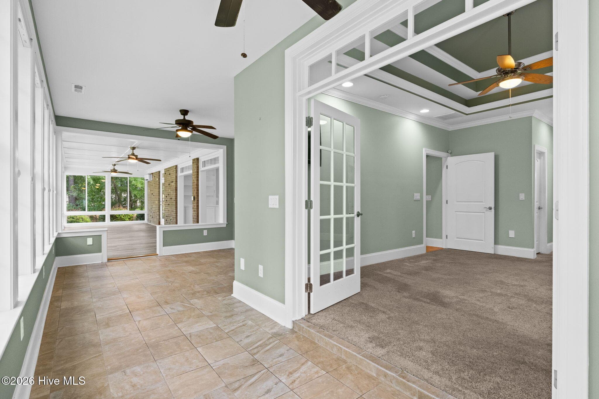 Primary Suite Exits to Sunroom - 461 Springwood Drive SE, Bolivia, NC 28422