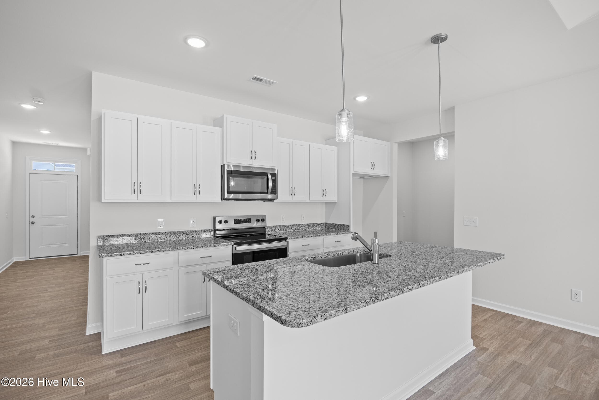 Home shown is a representation of the floor plan and may include optional features or upgrades. Elevations, materials, colors, finishes, square footage, and included features may vary from the actual home. Please consult a Sales Representative for complete details. - 544 Belfort Lane SW 156, Ocean Isle Beach, NC 28469