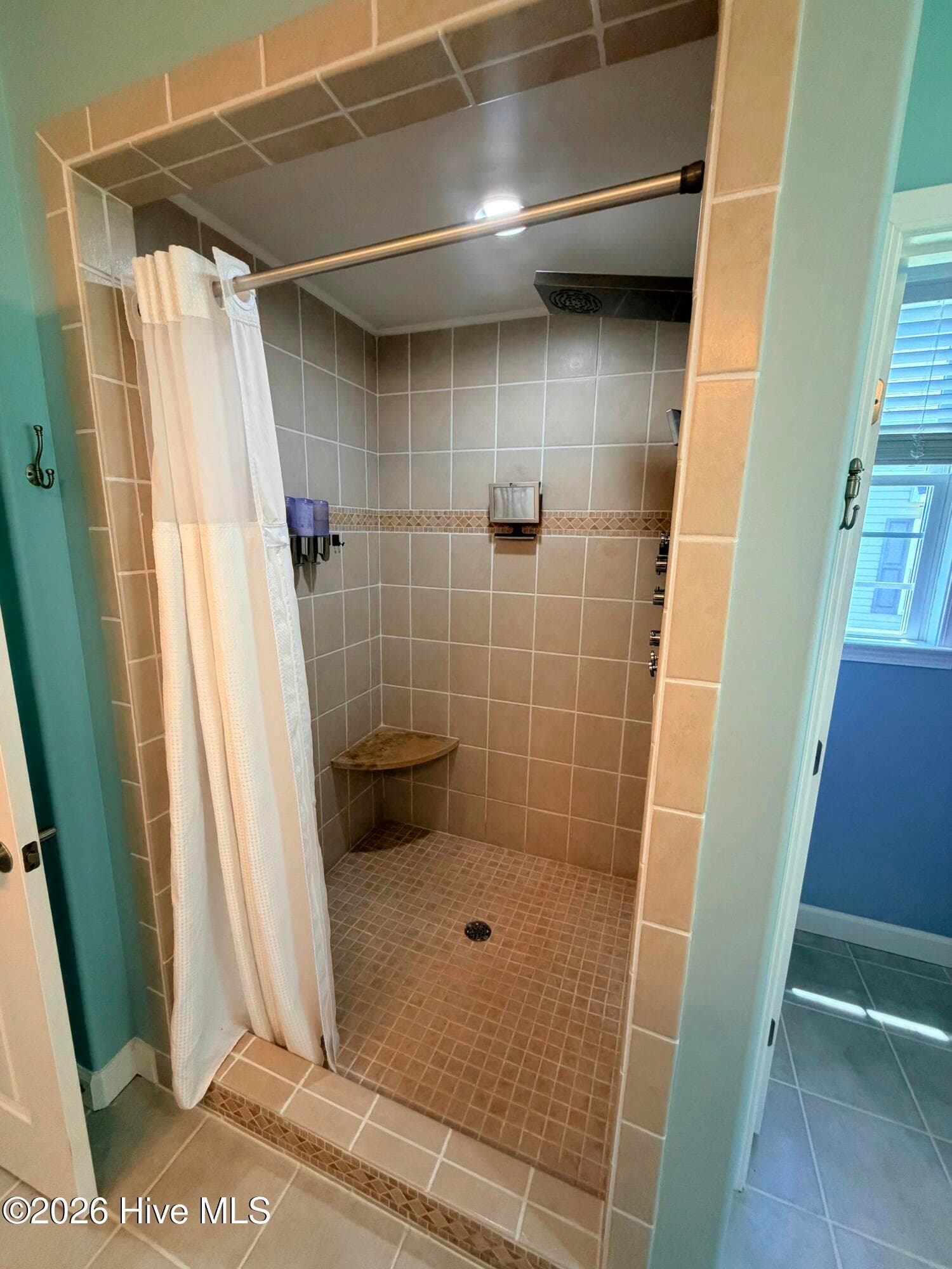 Walk in primary shower with spray nozzels for multiple shower heads and jet streams of water! - 1926 Snowy Egret Drive, Morehead City, NC 28557