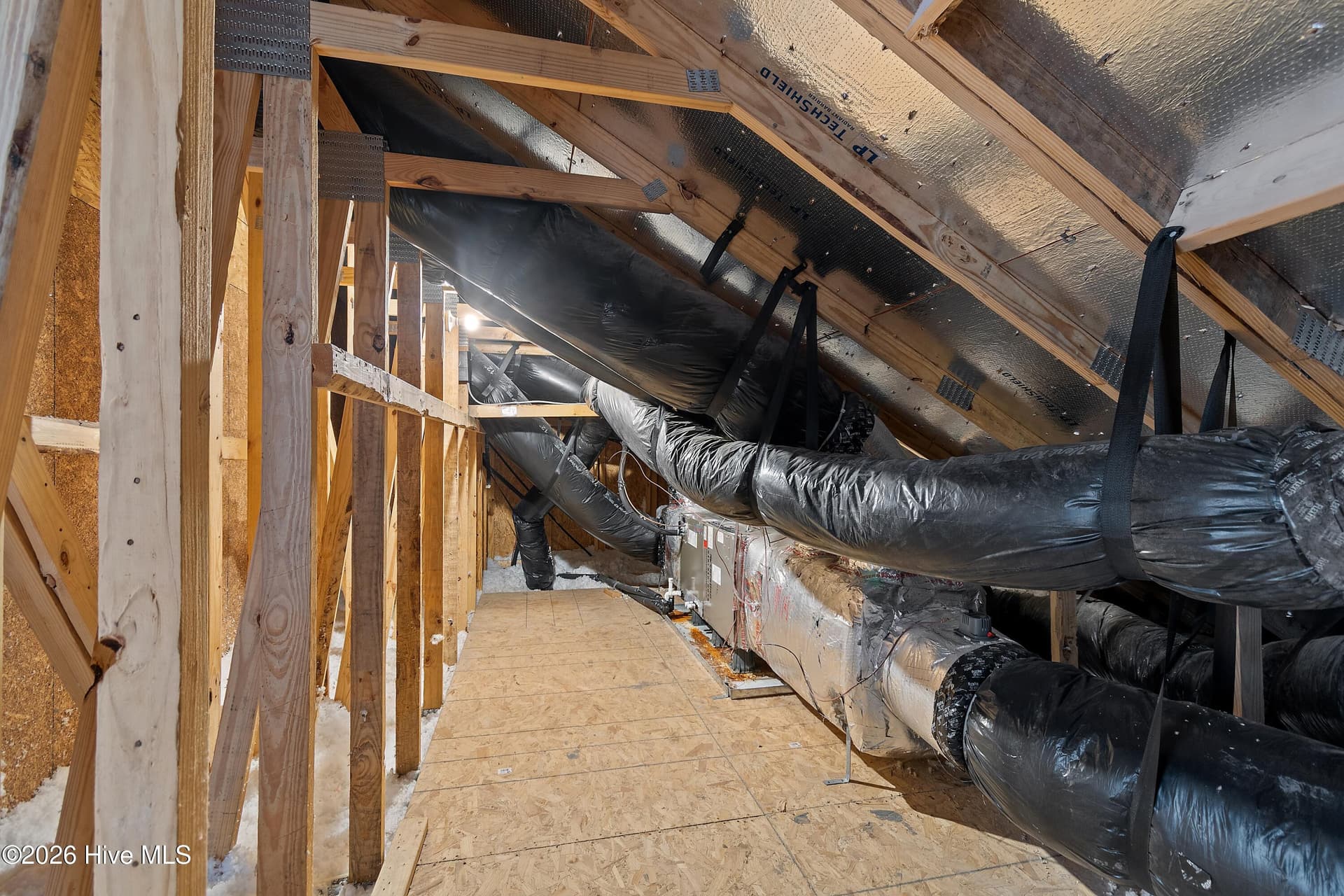 Additional storage area accessible from second floor. - 6358 Bryson Drive SW, Ocean Isle Beach, NC 28469