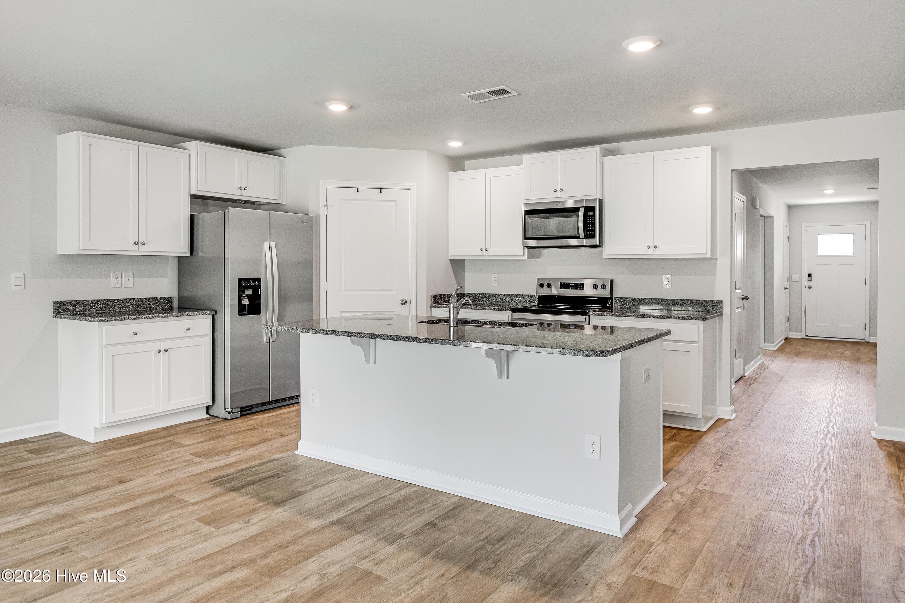 white cabinets - 1774 Culdees Lane SE, Bolivia, NC 28422