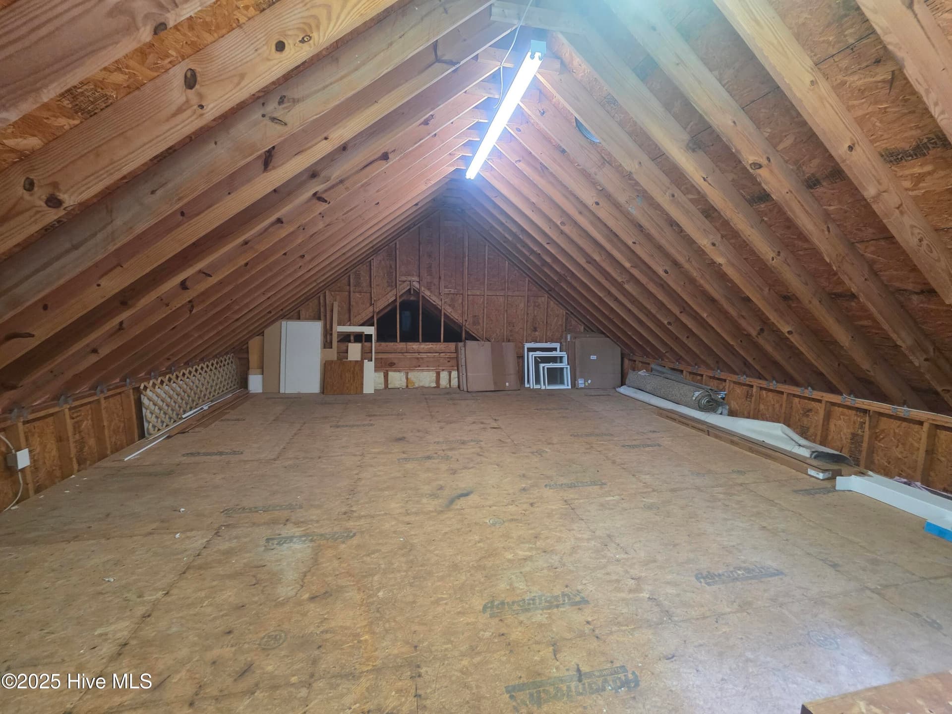 Floored storage above garage - 219 Drake Landing, New Bern, NC 28560