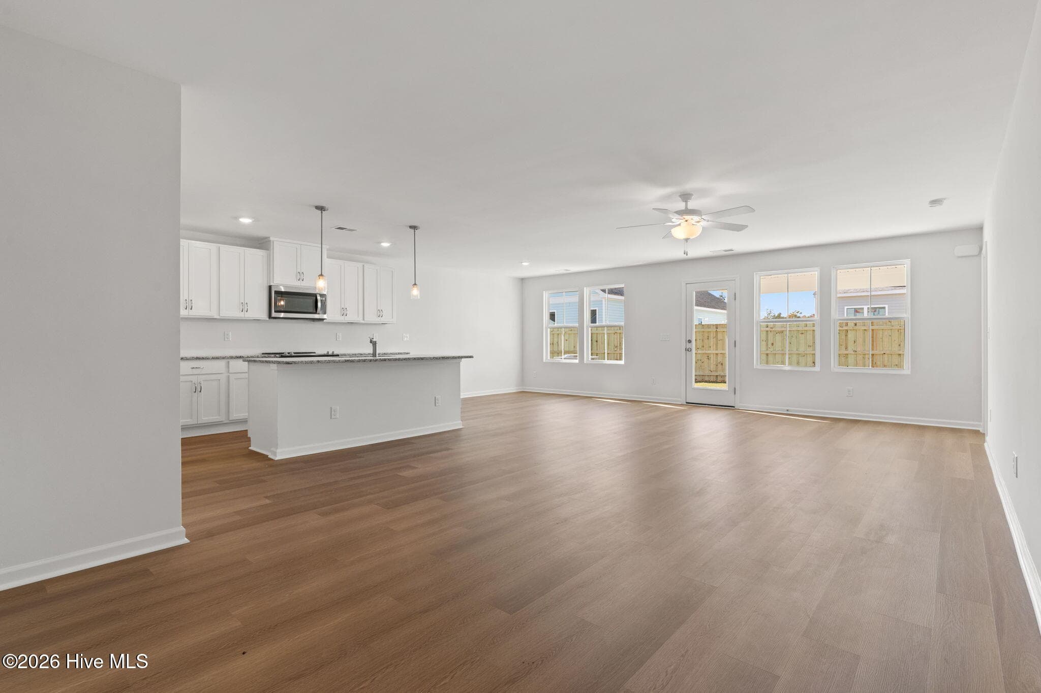 Home shown is a representation of the floor plan and may include optional features or upgrades. Elevations, materials, colors, finishes, square footage, and included features may vary from the actual home. Please consult a Sales Representative for complete details. - 629 Pelican Cove Way SE 247, Southport, NC 28461