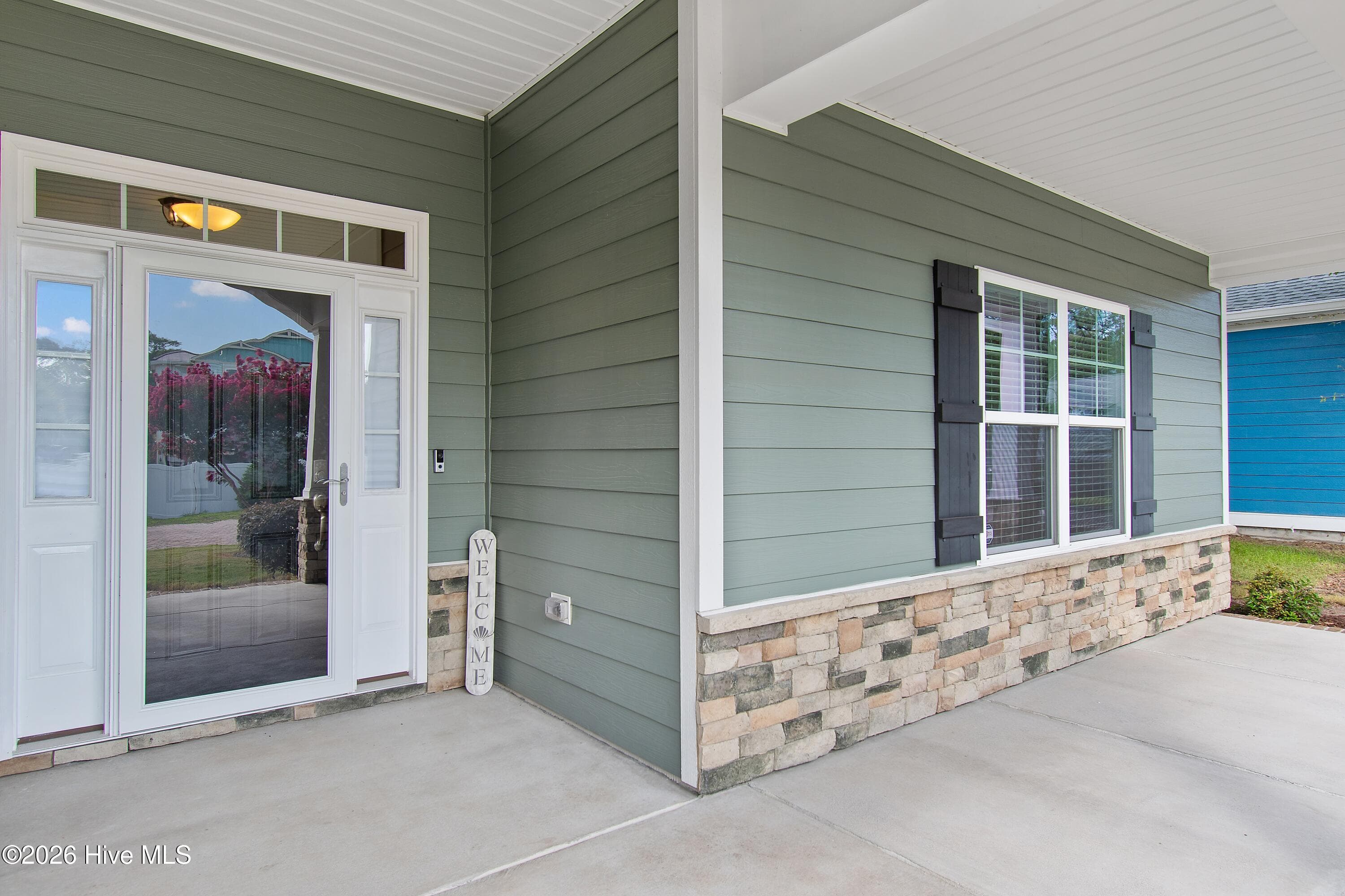 Glass storm door. Large front porch. - 1674 Back Bay Drive SW, Shallotte, NC 28470