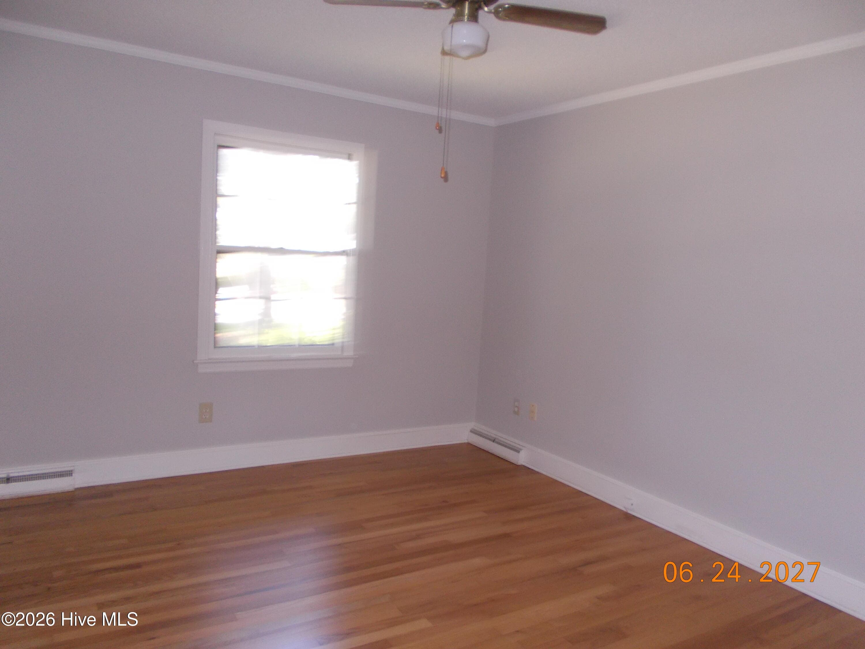 Bedroom with hardwood floors. - 2209 Stanton Road, Kinston, NC 28504