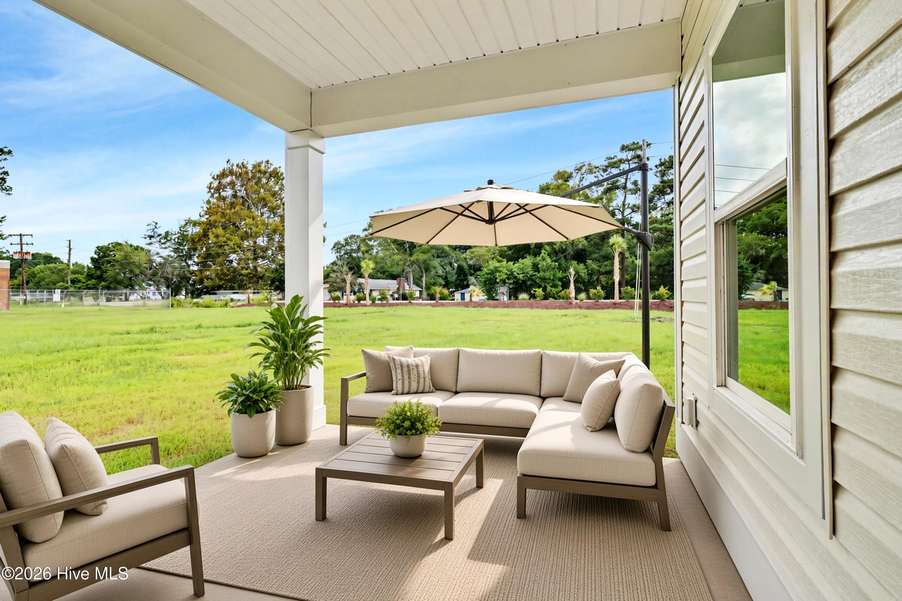 AI Staged Covered Patio - 2108 Cregan Cove SW (Lot 2), Ocean Isle Beach, NC 28469