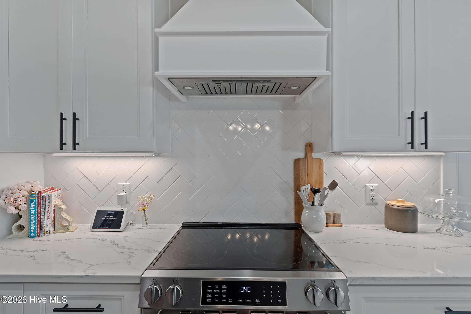 Vented hood, tile backsplash. - 299 Boundaryline Drive NW, Calabash, NC 28467