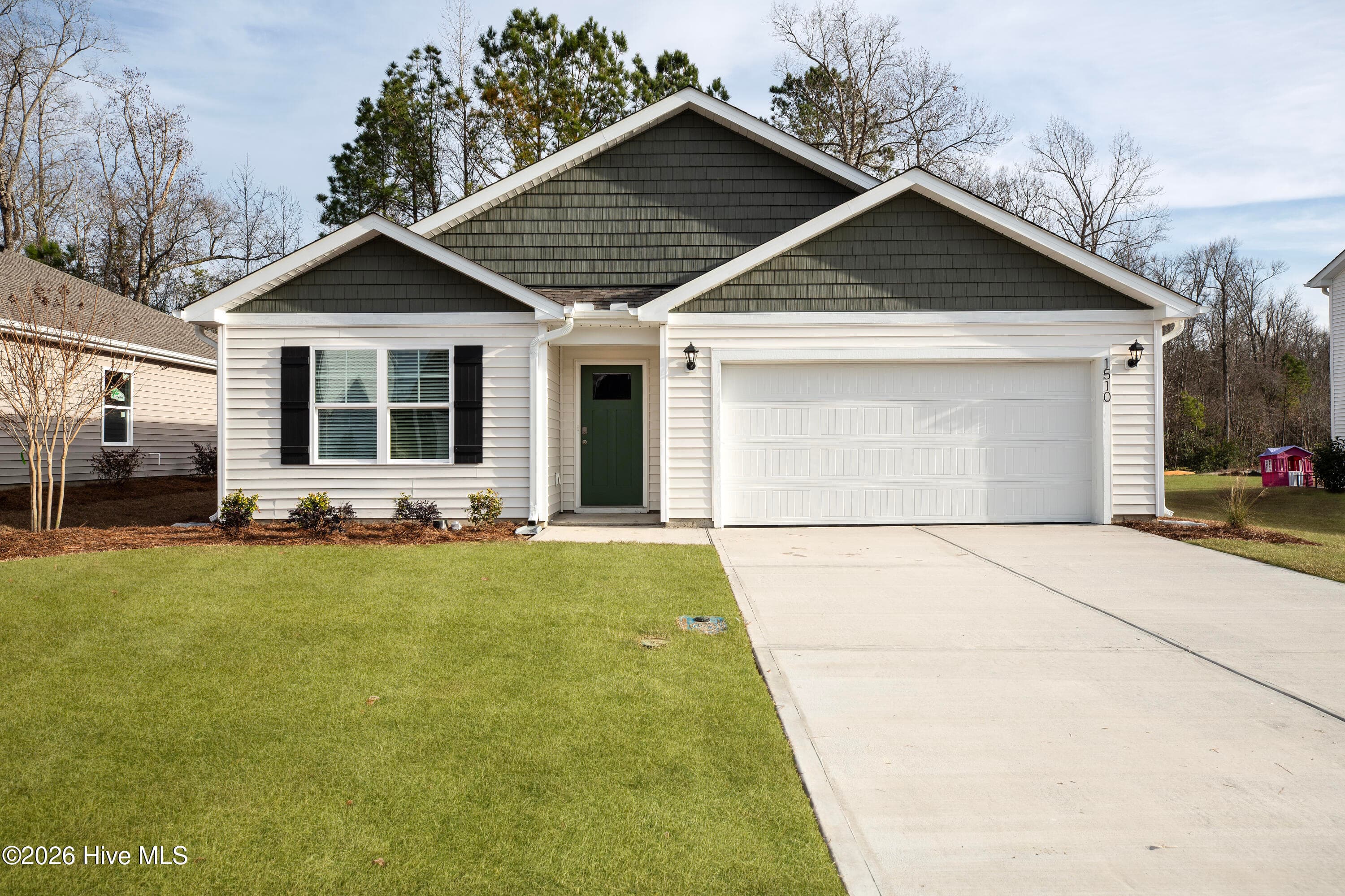 Exterior photo is of similar, completed home. Actual colors may vary - 1554 E White Egret Lane NE Lot 737, Bolivia, NC 28422