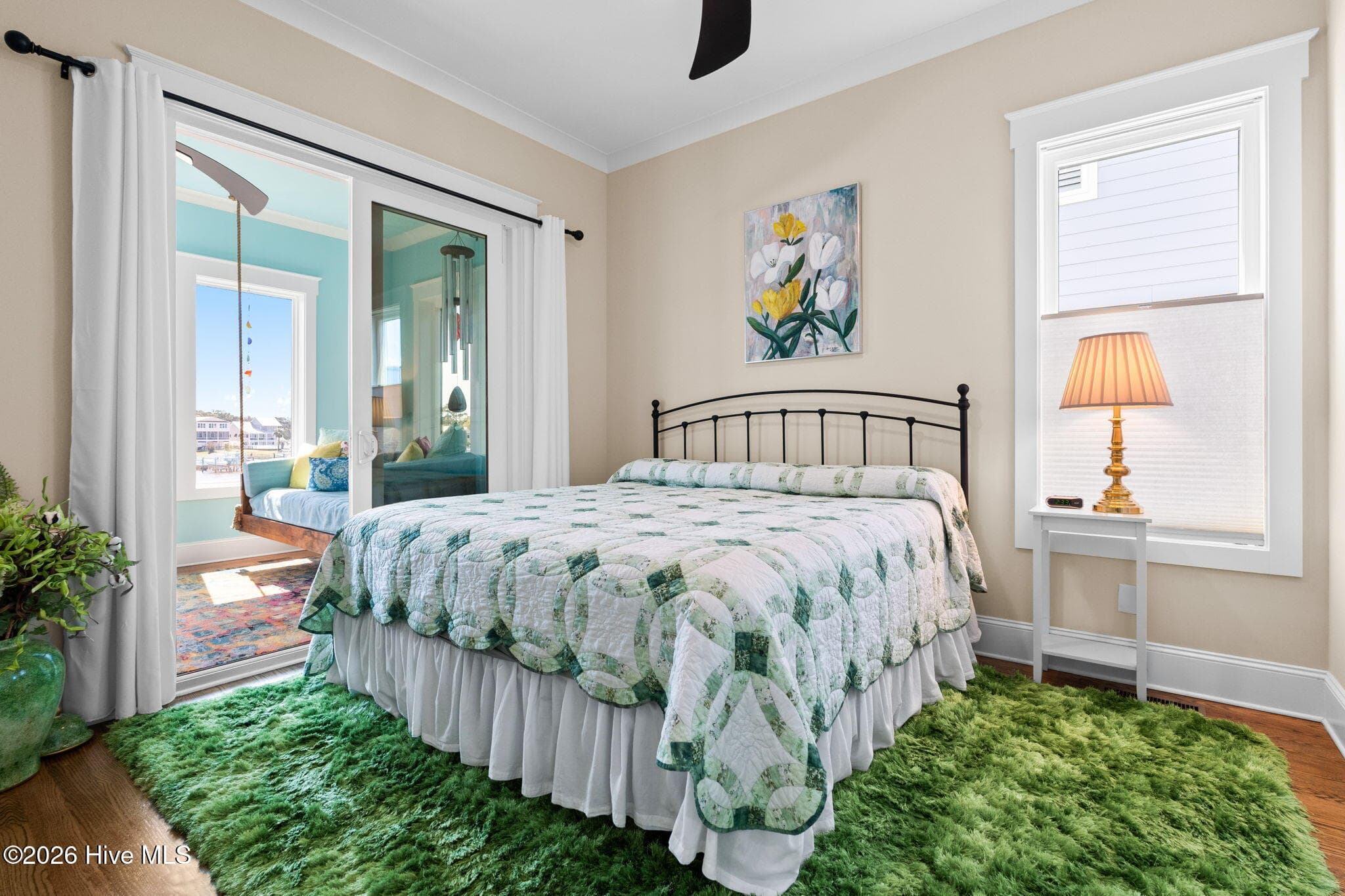 King size bed easily fits in the bedroom with direct access to the Carolina room - 2775 Long Bay Drive SE, Southport, NC 28461