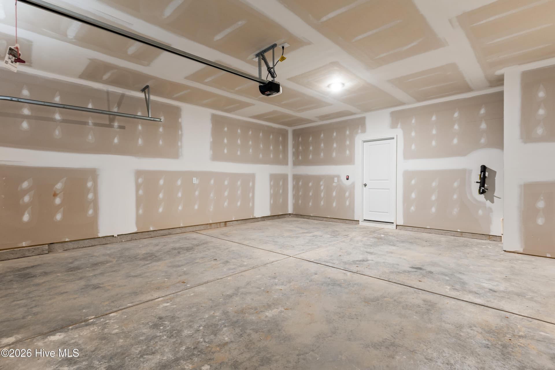 Comes with garage door opener and two remotes. - 148 N Squires Run Lane, Richlands, NC 28574