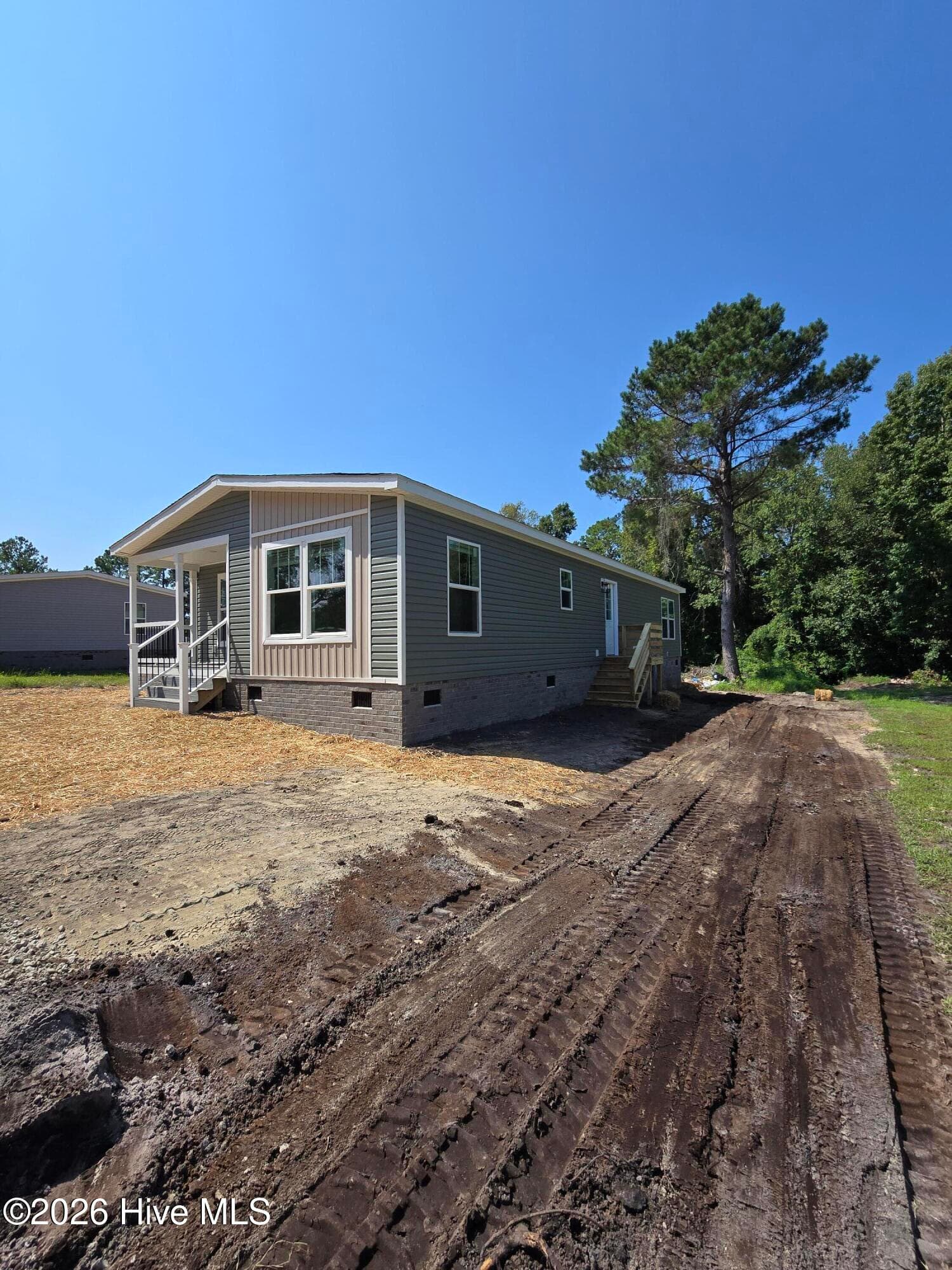 Manufactured Home at 106 Dundee Trail, Holly Ridge, NC 28445, photo 3 of 46