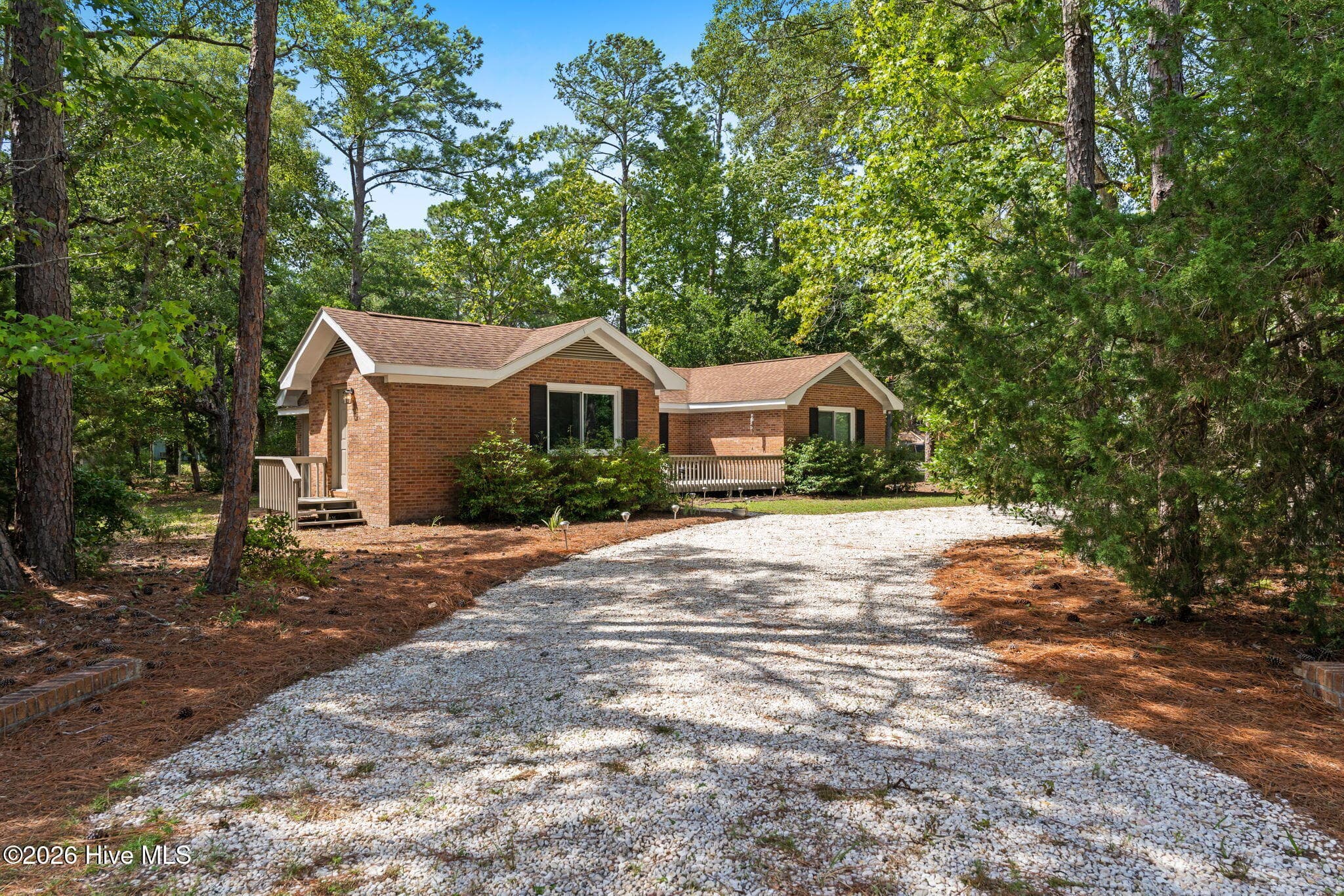 circular driveway - 1 Golfview Court, Carolina Shores, NC 28467