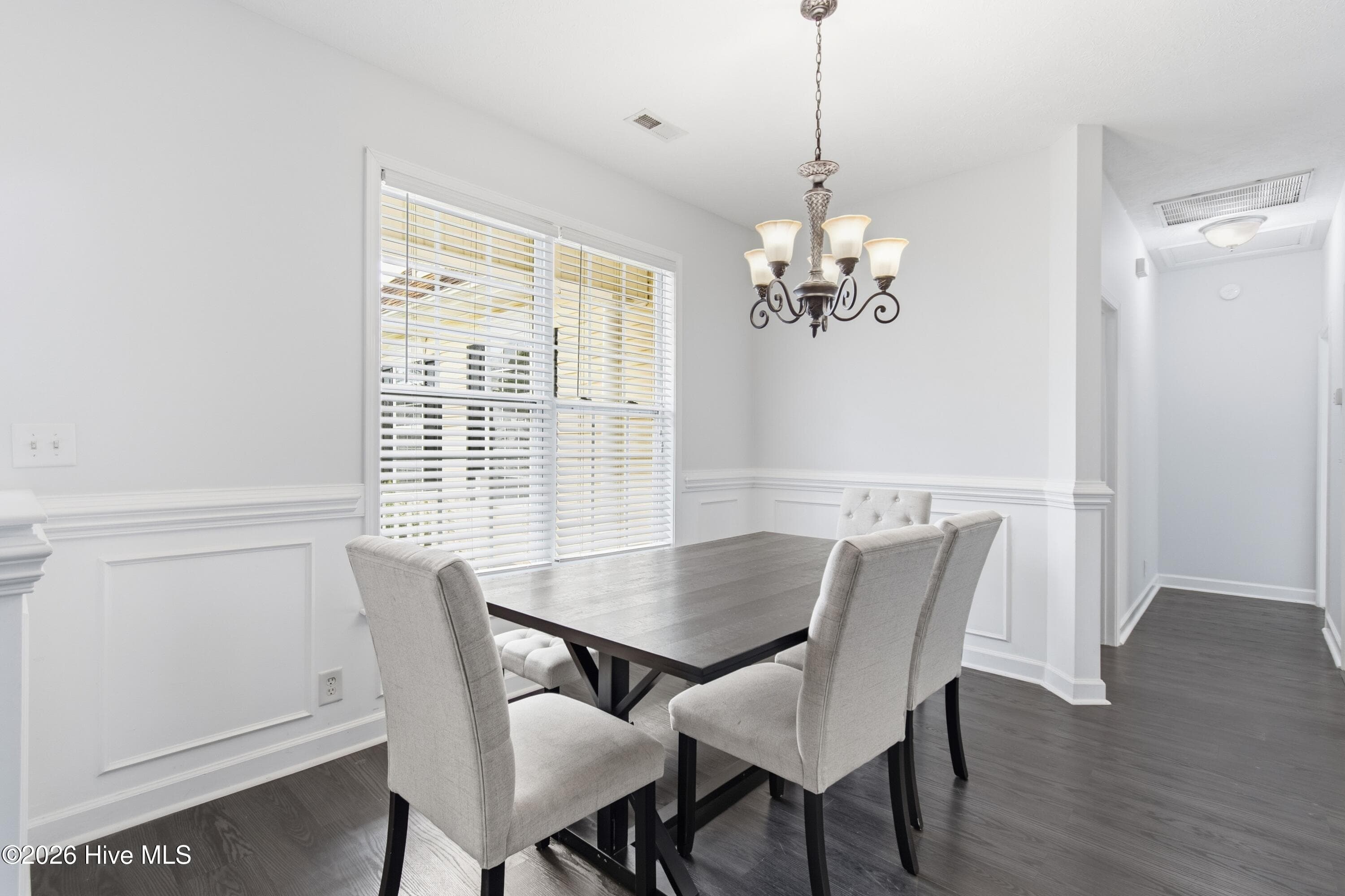 Formal dining room, open to living room. - 709 E Pipers Glen, Shallotte, NC 28470