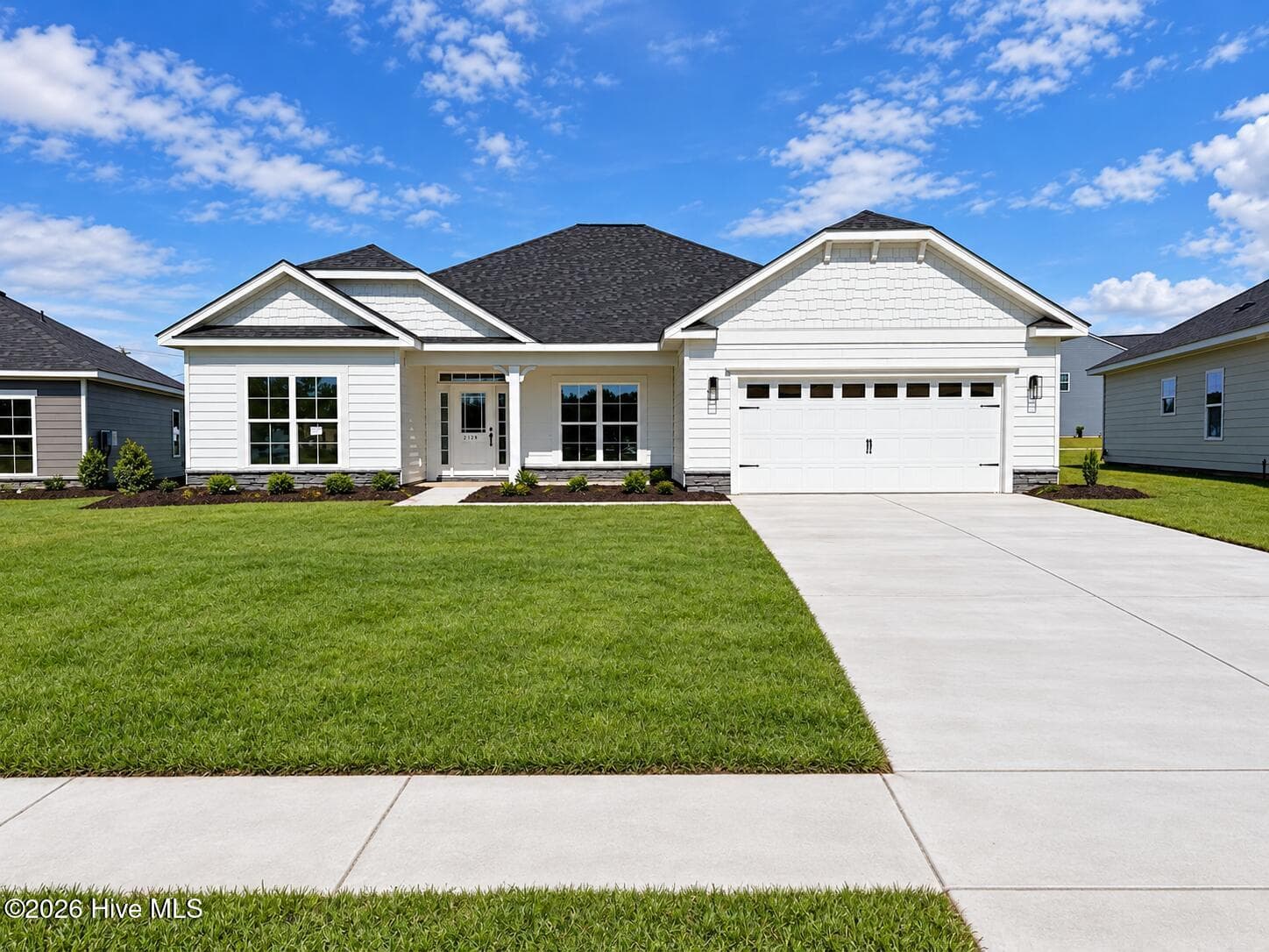 Actual home for sale. Photo taken 9/26 - 2129 Sandbrook Loop, Leland, NC 28451