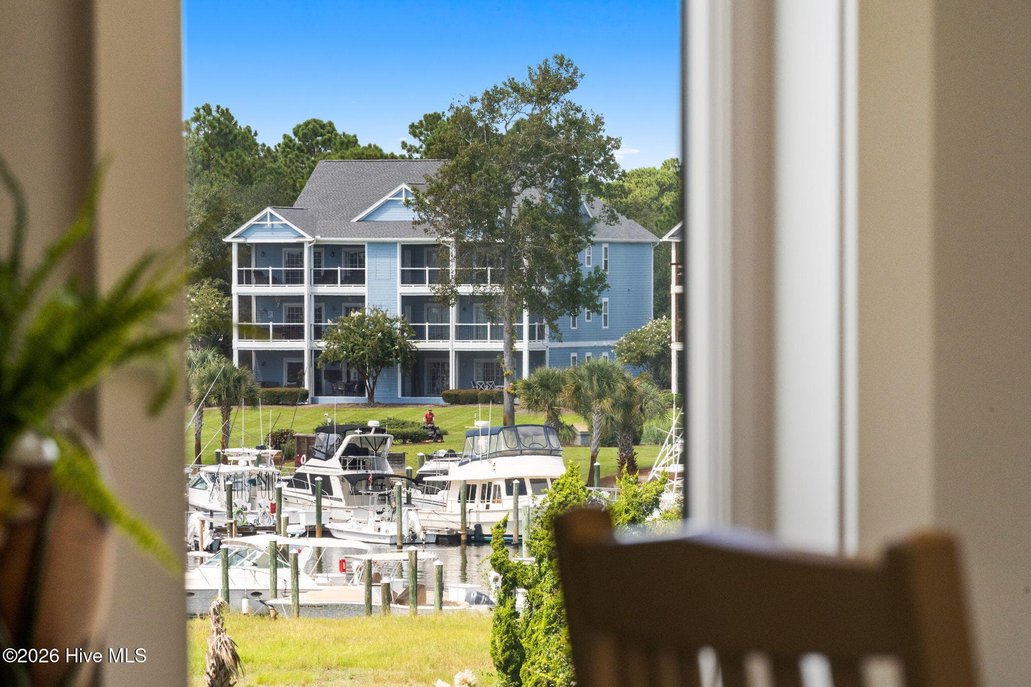 You get a peak of the St James Marina from your dining seat - 2775 Long Bay Drive SE, Southport, NC 28461