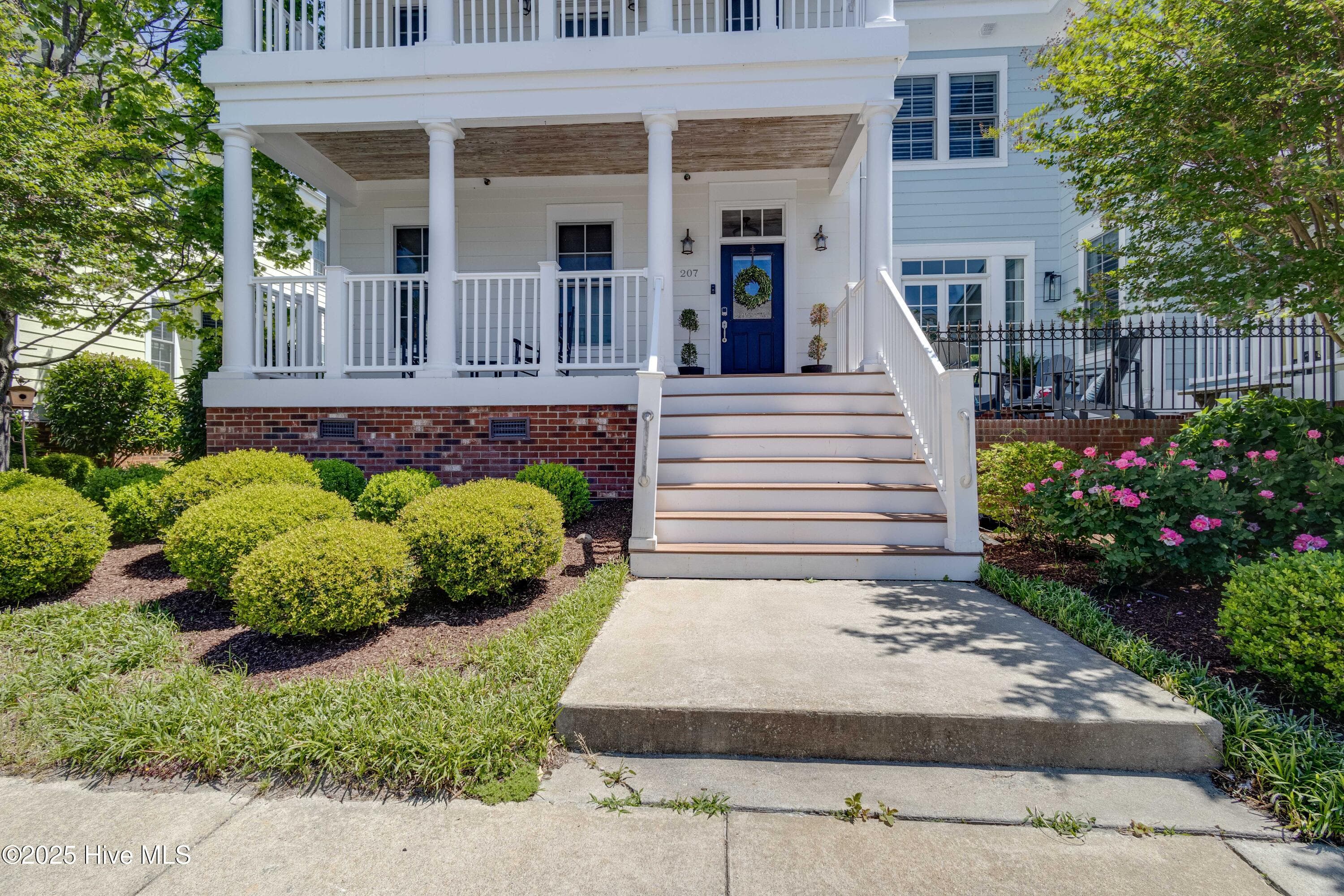 Park right at your front door, or make your way around back to your two-car garage. - 207 S Academy Street, Washington, NC 27889