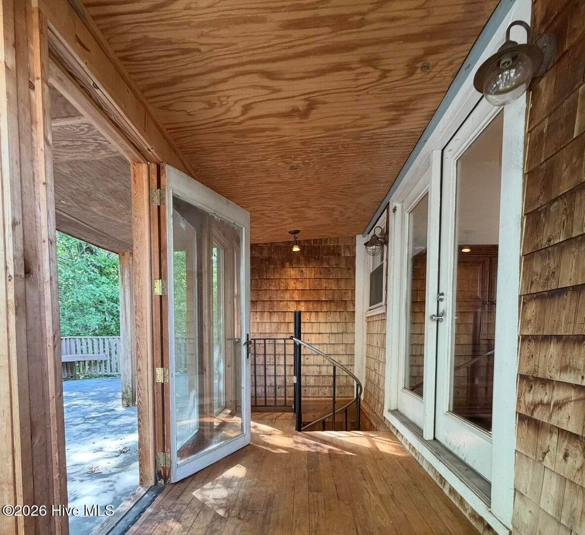 spiral staircase to downstairs - 2704 Waccamaw Shores Road, Lake Waccamaw, NC 28450