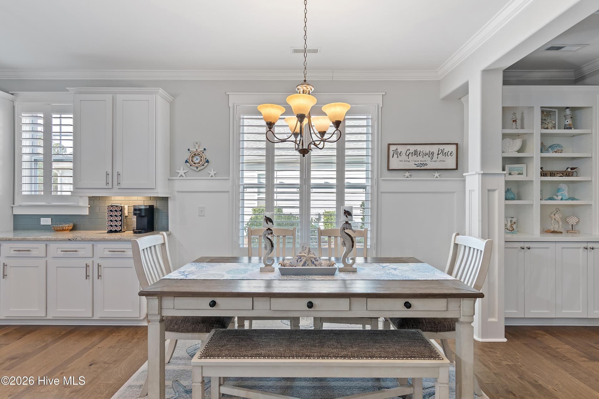 Wainscoting, upgraded trim and large dining area. - 6358 Bryson Drive SW, Ocean Isle Beach, NC 28469