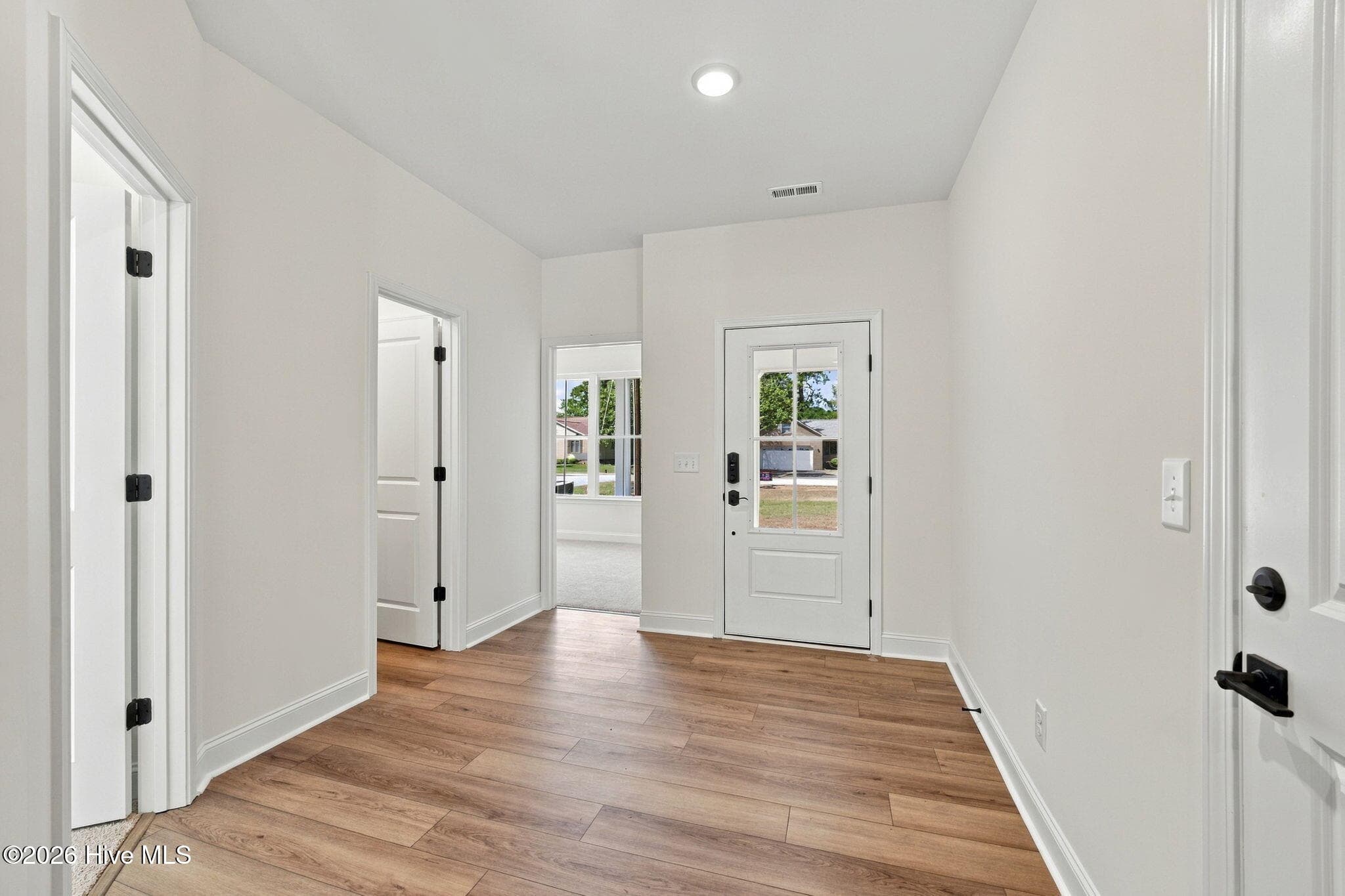 Inviting and Open, the Foyer makes your guests feel welcome and ties in beautifully to the open floor plan - 1224 Petite Terre Court, New Bern, NC 28560