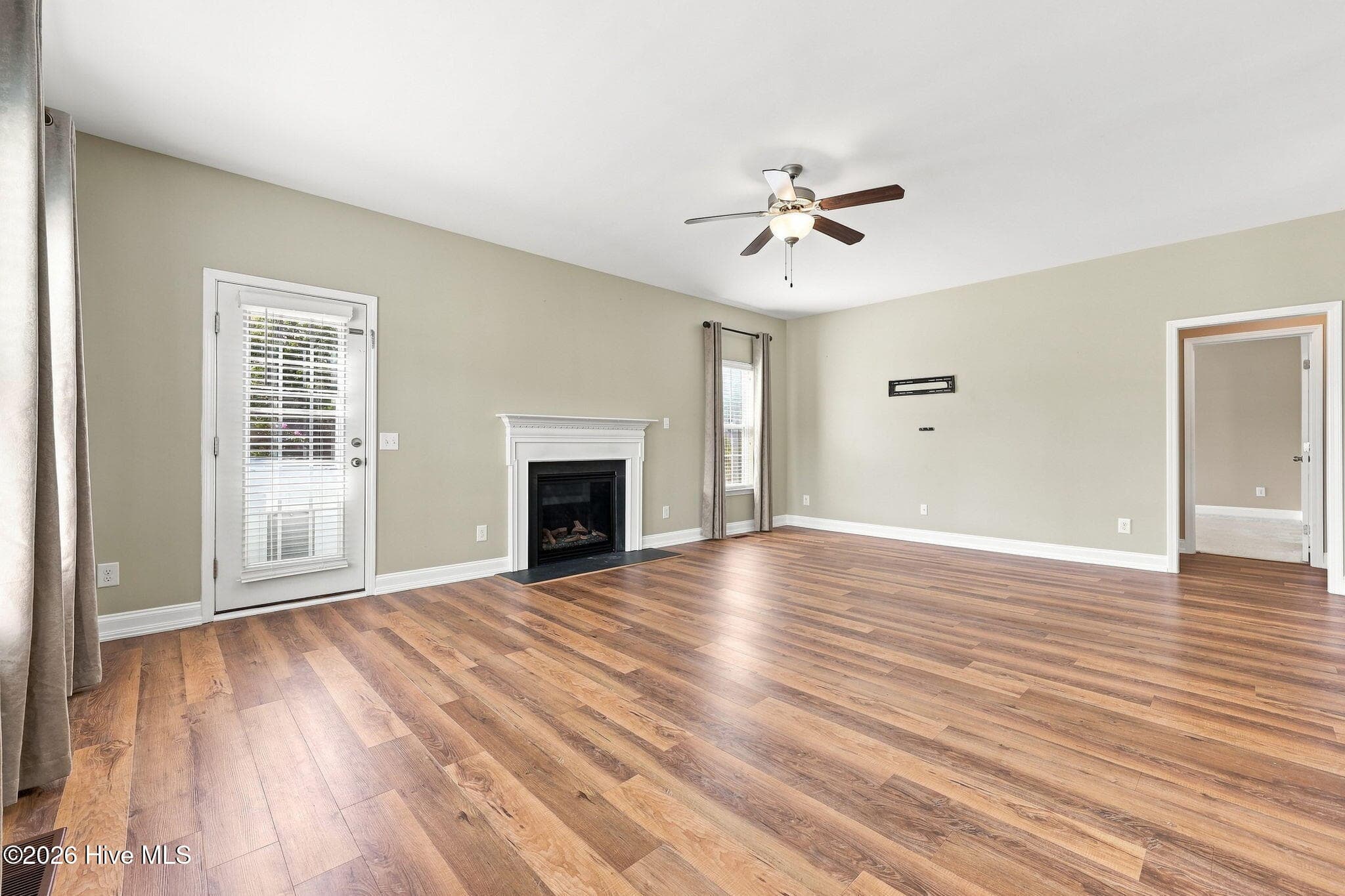 Living Room Highlighting Gas Logs - 1284 L Cooper Road, Cameron, NC 28326