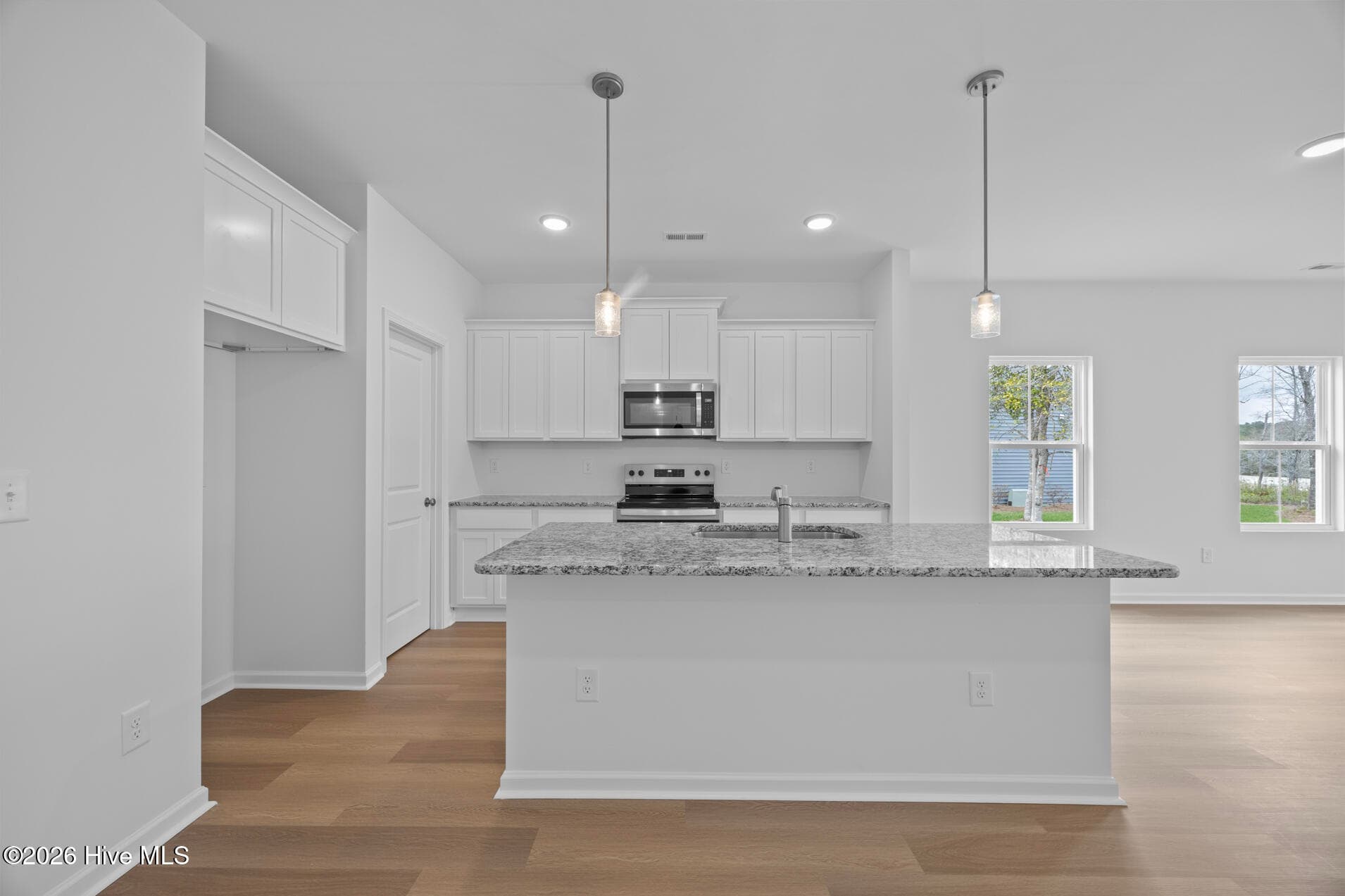 Home shown is a representation of the floor plan and may include optional features or upgrades. Elevations, materials, colors, finishes, square footage, and included features may vary from the actual home. Please consult a Sales Representative for complete details. - 625 Pelican Cove Way SE 248, Southport, NC 28461