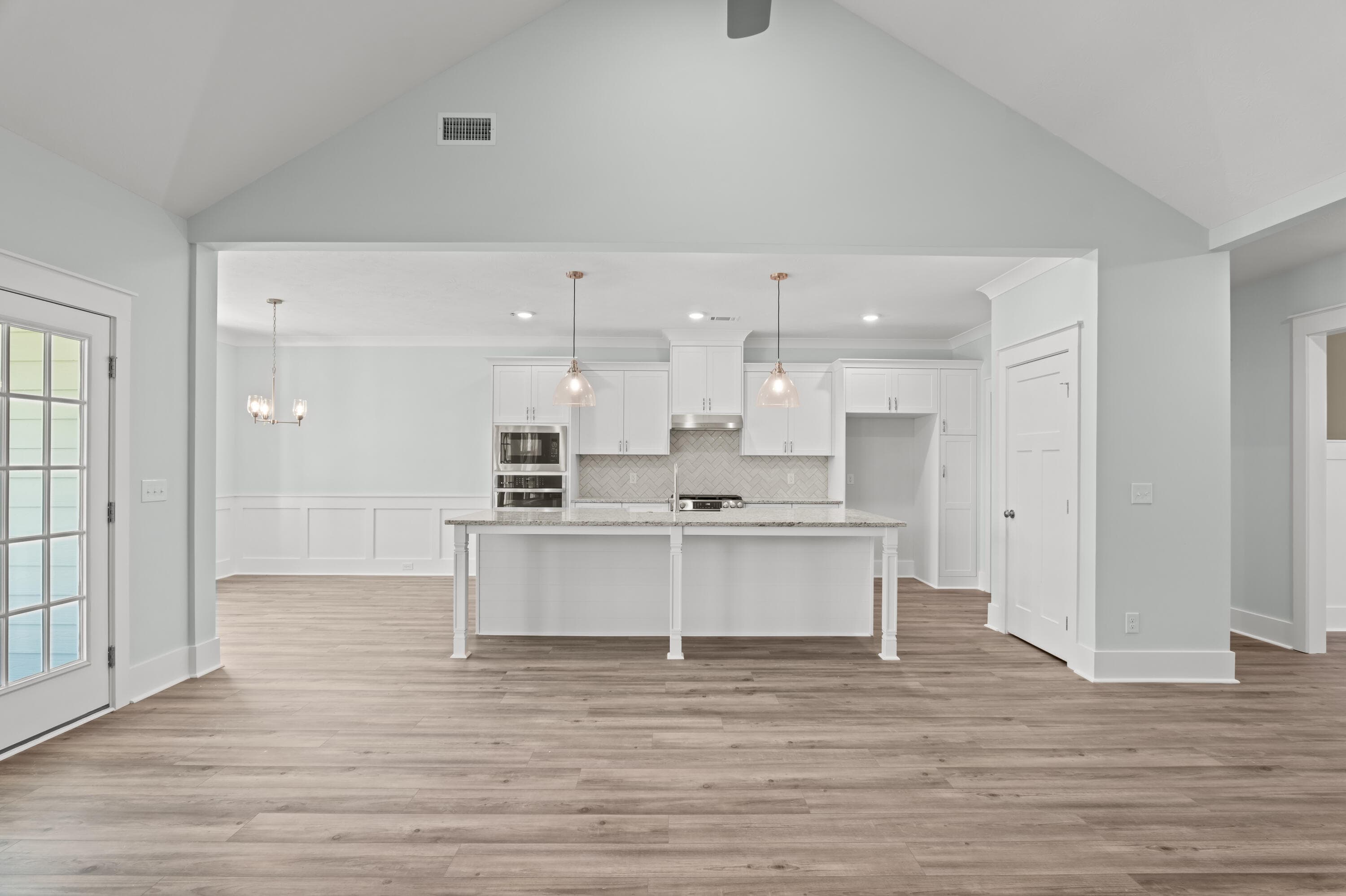 Click flooring throughout main living spaces - 1488 Bellingham Drive, Beech Island, SC 29842