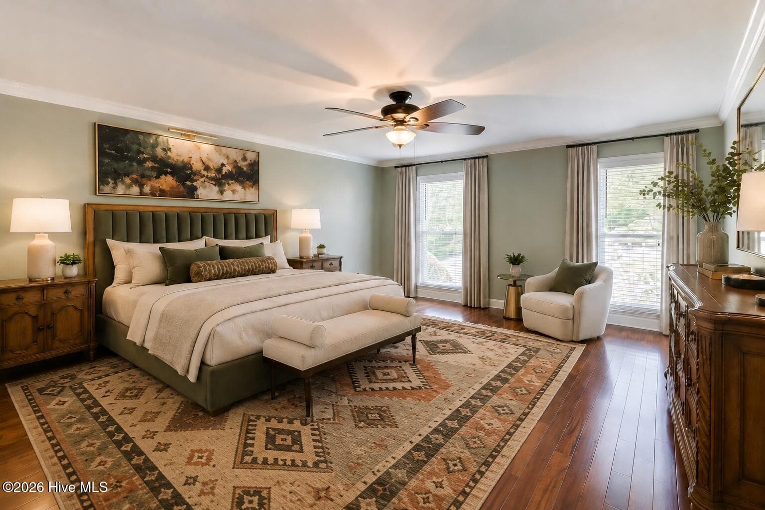 A spacious main floor primary suite with warm hardwoods, soft neutral tones, and room for a full furniture layout without feeling crowded. - 16 Rapids Court, North Augusta, SC 29841