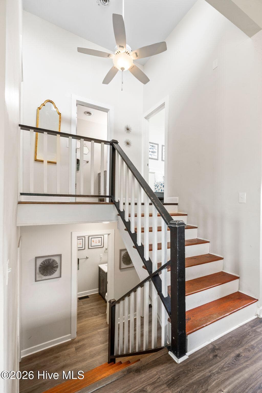 Three levels, four bedrooms and plenty of places to disappear for a minute. - 129 S Anderson Boulevard A, Topsail Beach, NC 28445