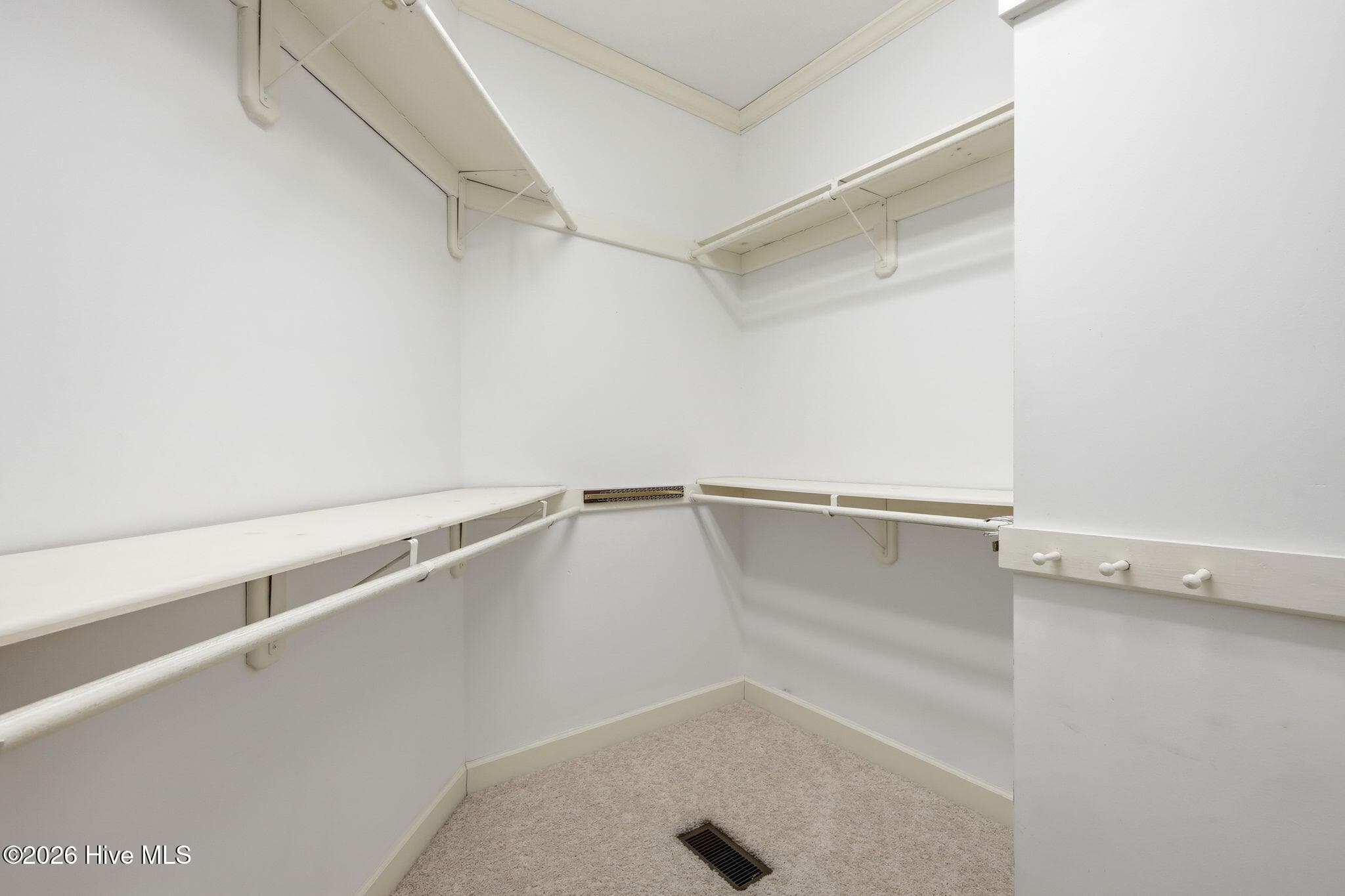 Walk-in primary closet - 104 Talford Drive, Atlantic Beach, NC 28512