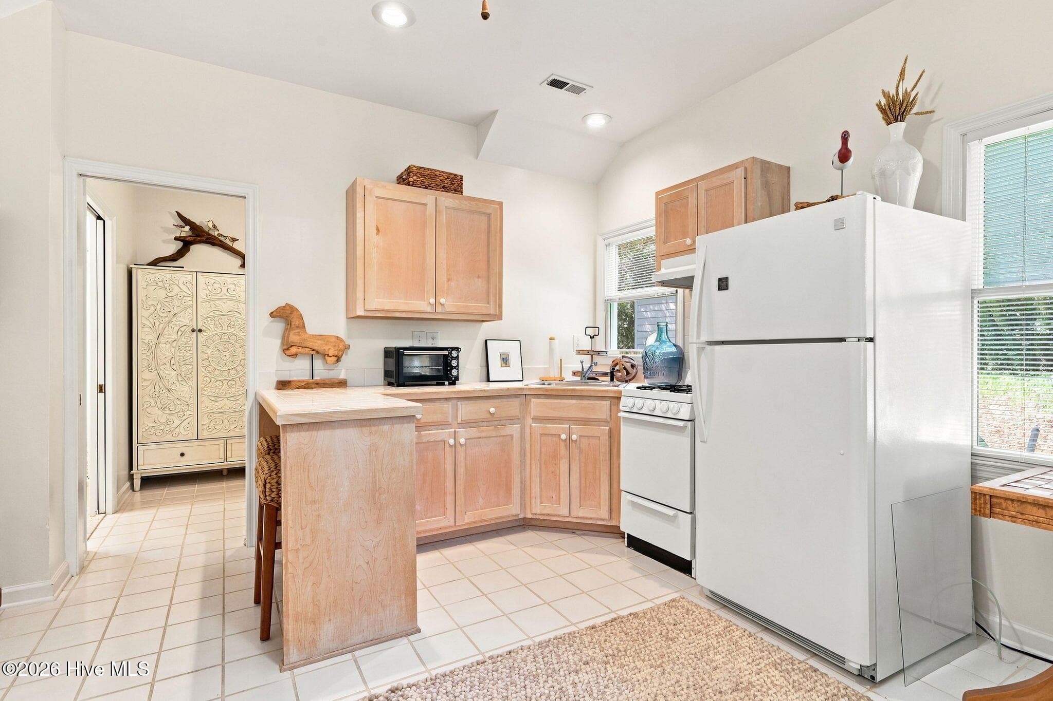 Separate one-bedroom ground-floor apartment provides additional living space and flexibility for guests or extended stays. - 103 Georgia Street, Emerald Isle, NC 28594