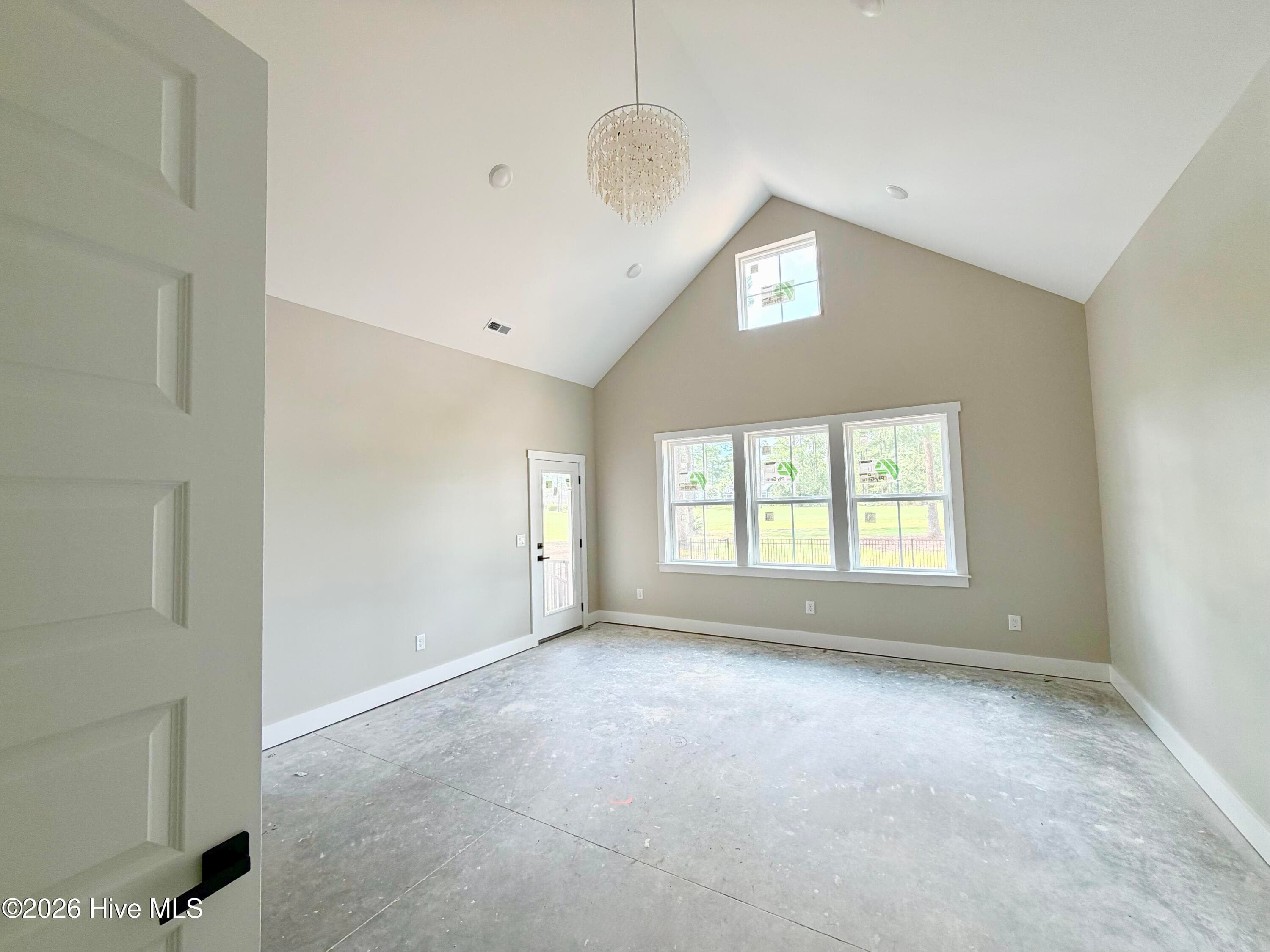 Primary suite with custom lighting, private porch, ensuite bath and walk in closet, under construction. - 550 Glenburnie Street NW, Calabash, NC 28467
