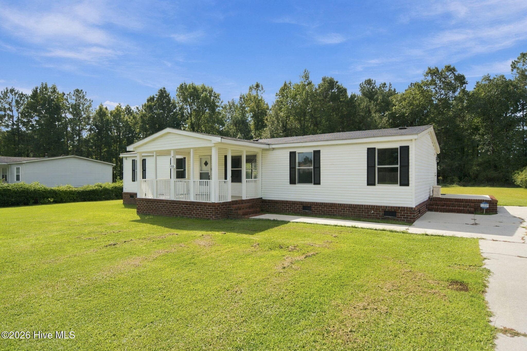 Manufactured Home at 185 New Hope Lane SE, Leland, NC 28451, photo 3 of 49
