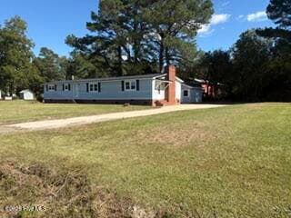 Manufactured Home at 1232 Mark Edwards Road, Goldsboro, NC 27534, photo 4 of 20
