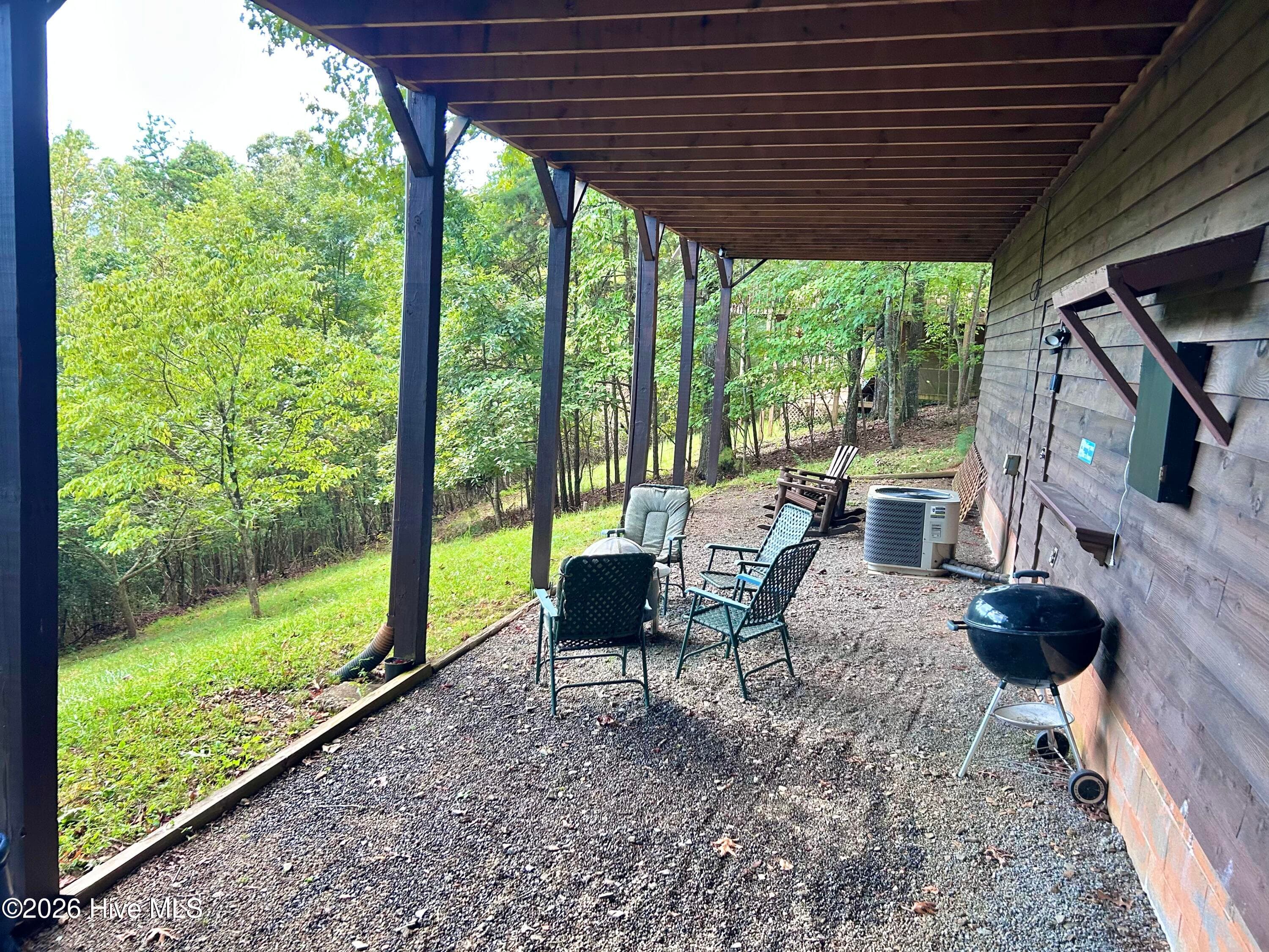 Below deck area, access to huge crawl space storage - 234 Ashley Lane, Murphy, NC 28906