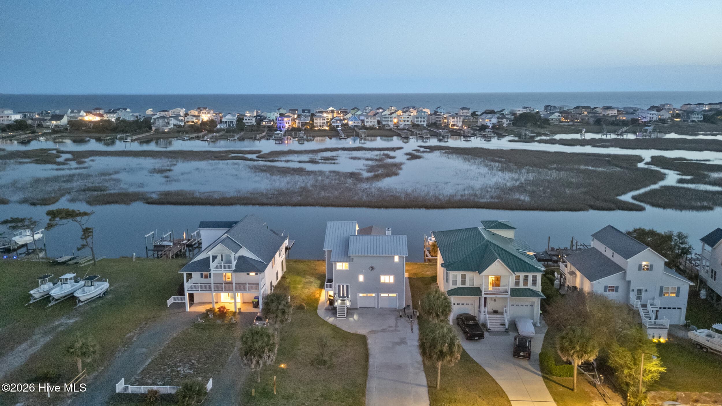Single Family Residence at 103 E Island Drive, Oak Island, NC 28465, photo 105 of 118