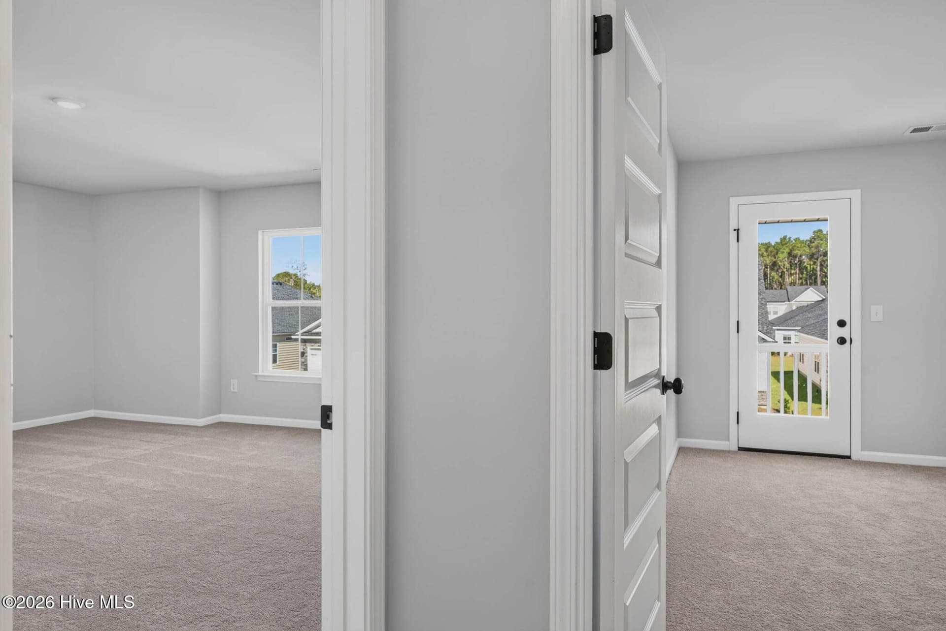 Spacious upstairs guest suite with convenient access to a private ensuite bathroom. - 3447 Sandhill Crane Drive SW, Ocean Isle Beach, NC 28469