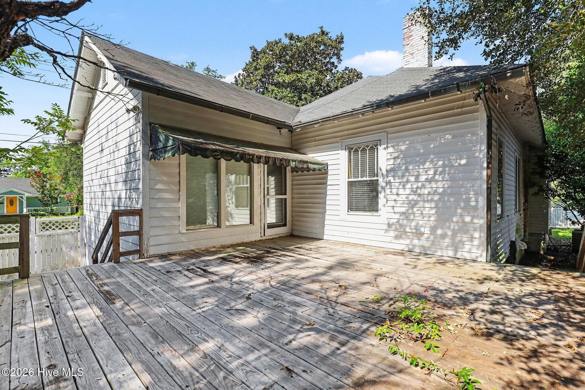 Rear deck view with family room access - 202 N Green Street, Selma, NC 27576