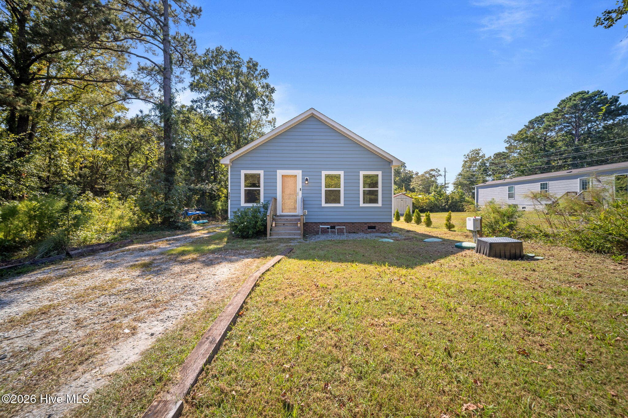 Single Family Residence at 404 Jamaica Drive, Hampstead, NC 28443, photo 2 of 27