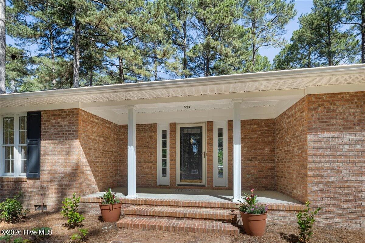 Single Family Residence at 30 Birdie Drive, Whispering Pines, NC 28327, photo 2 of 26