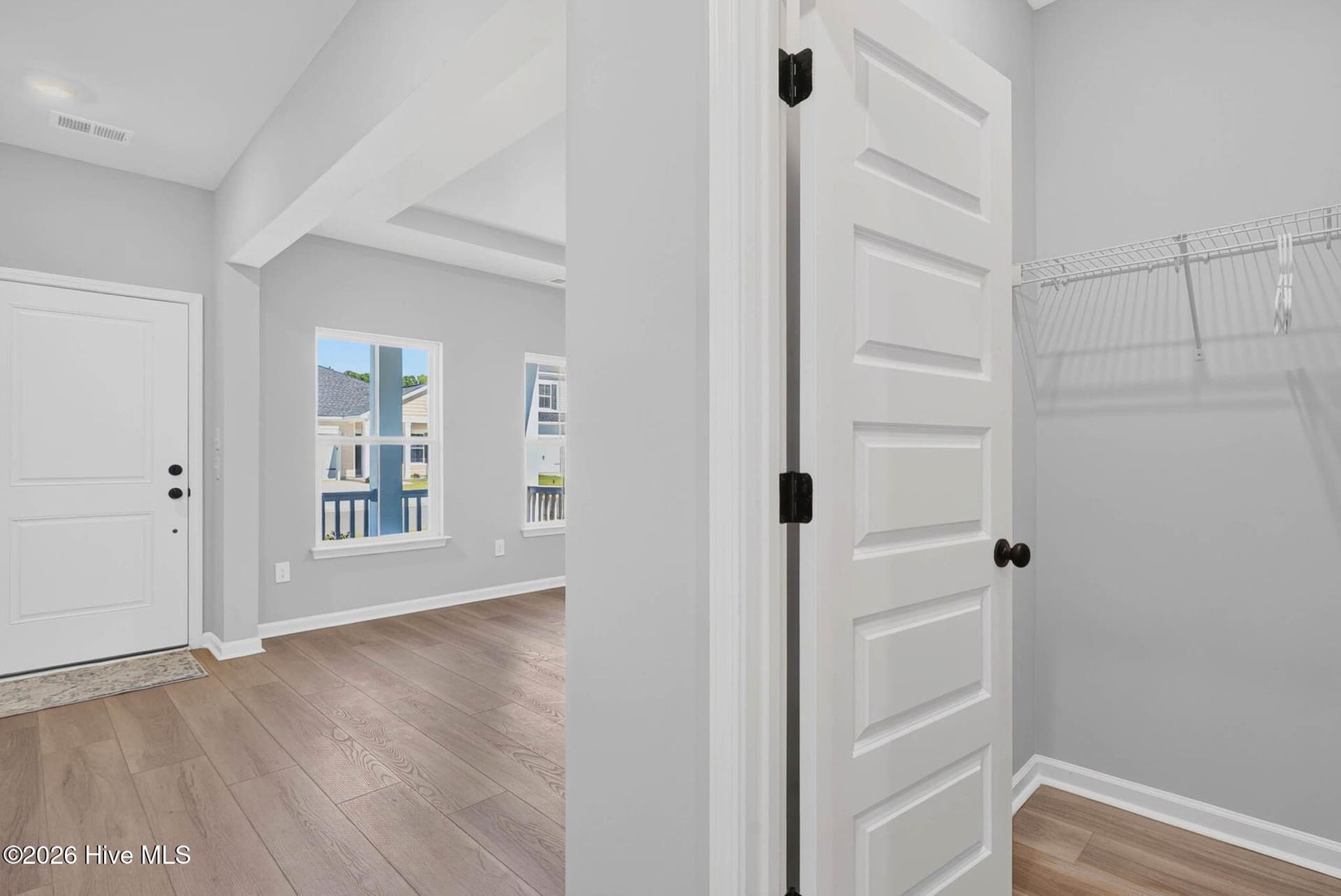 Inviting entryway with bright interior finishes and an open flow into the home's main living spaces. - 3447 Sandhill Crane Drive SW, Ocean Isle Beach, NC 28469