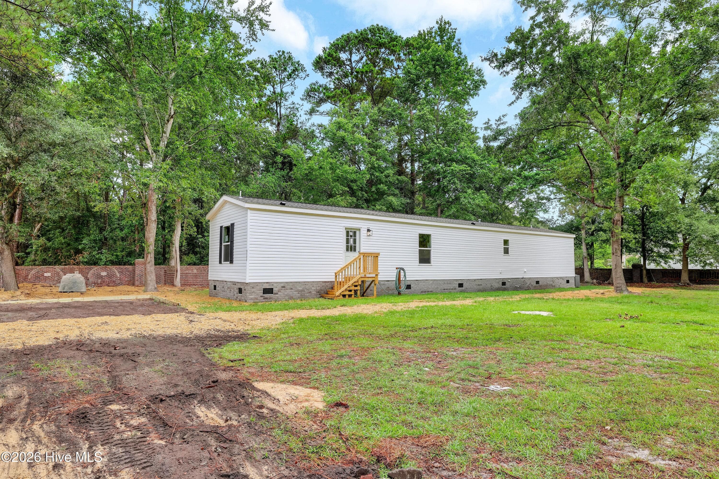 Manufactured Home at 9180 Central Boulevard SE, Winnabow, NC 28479, photo 31 of 32