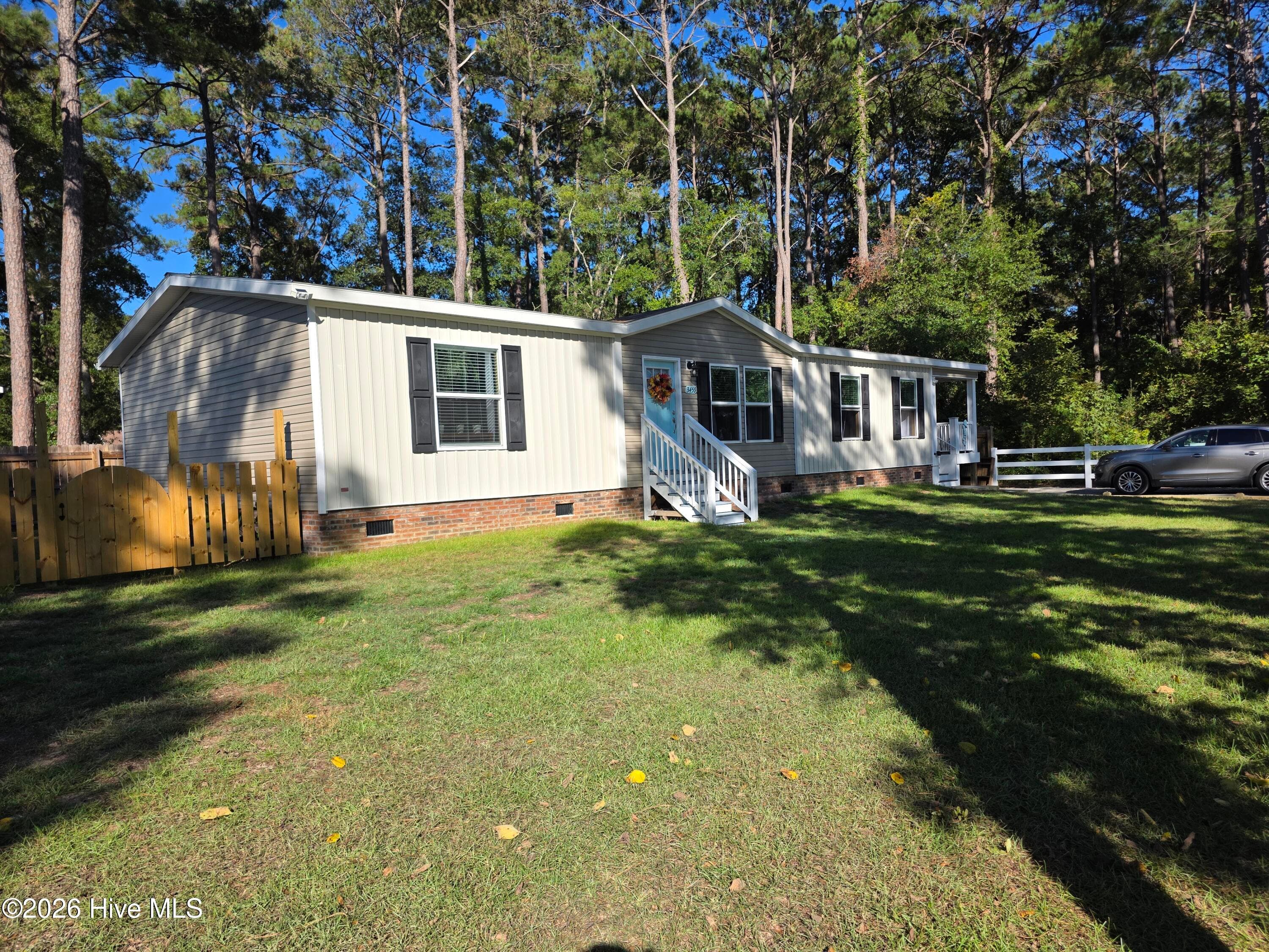 Manufactured Home at 3459 Lakeview Drive SW, Supply, NC 28462, photo 3 of 70