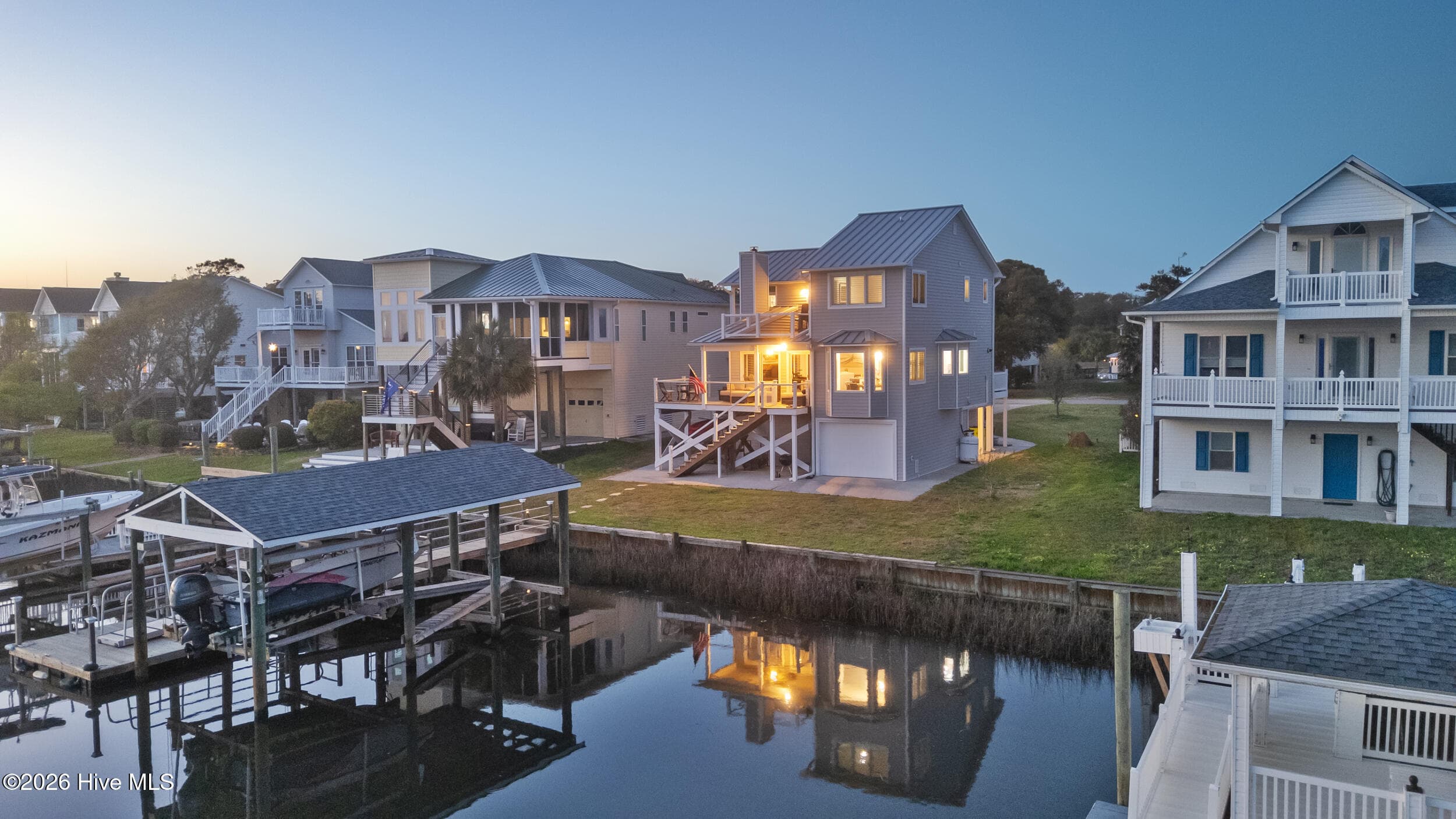Single Family Residence at 103 E Island Drive, Oak Island, NC 28465, photo 2 of 118
