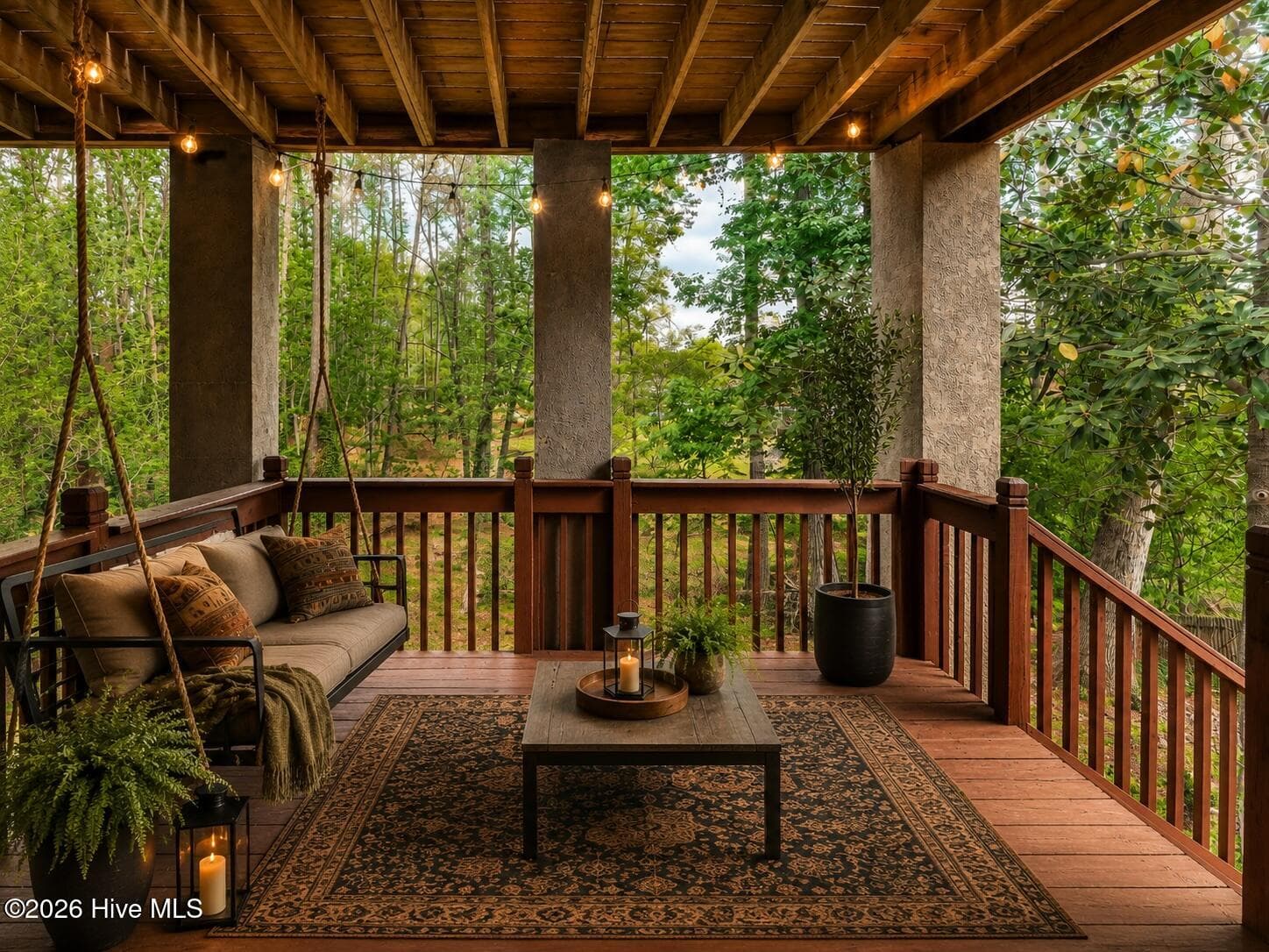 Lower Level Covered Deck: A dreamy covered deck overlooking the trees — the perfect spot for morning coffee, evening wine, or quiet outdoor living. - 16 Rapids Court, North Augusta, SC 29841