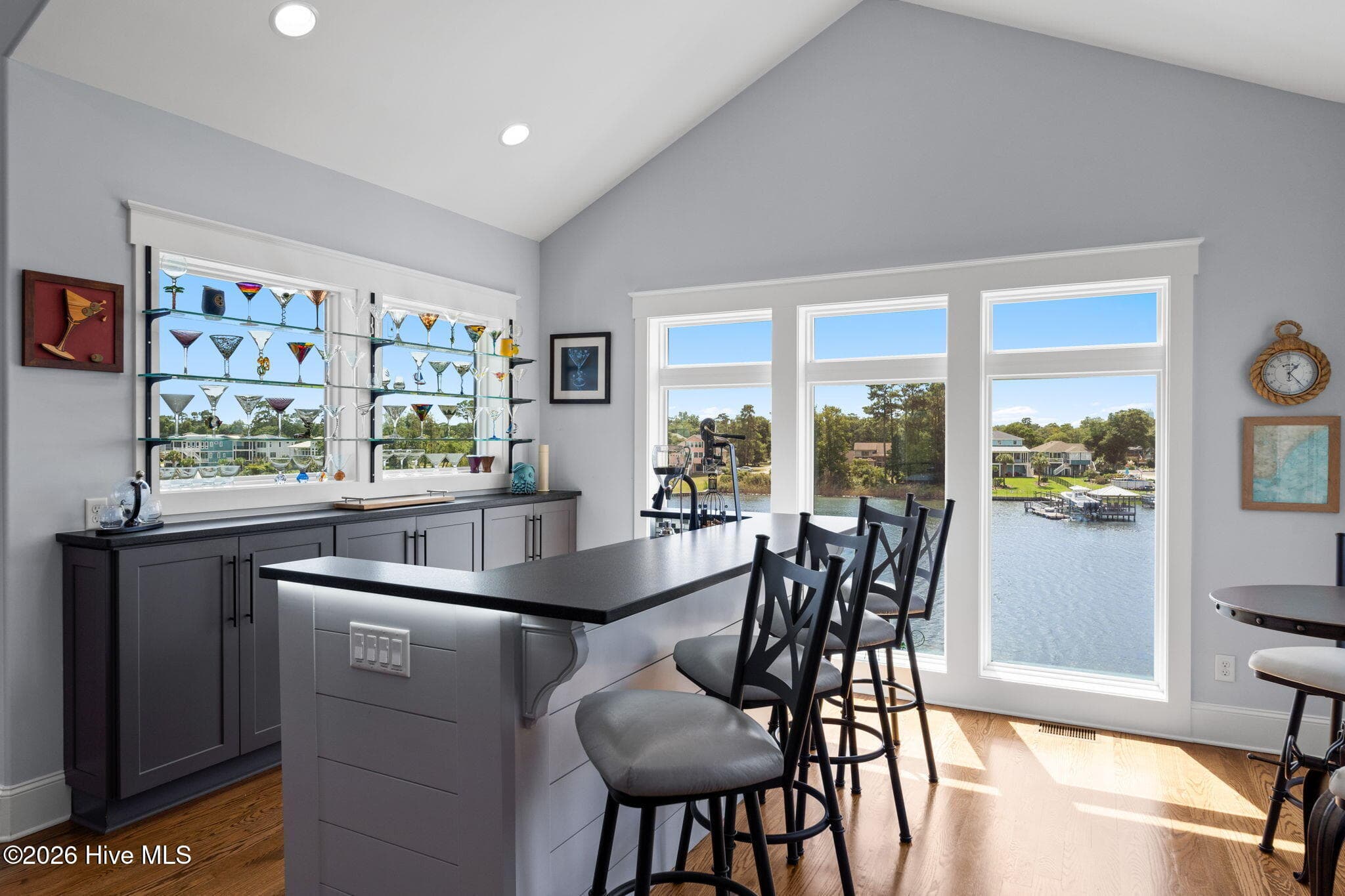 Imagine sitting at the bar, sipping your favorite martini, watching the boats go by - 2775 Long Bay Drive SE, Southport, NC 28461